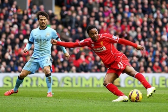 LIVERPOOL, ENGLAND - MARCH 01:  Raheem Sterling of Liverpool directs a shot on goal during the Barclays Premier League match between Liverpool and Manchester City at Anfield on March 1, 2015 in Liverpool, England.  (Photo by Clive Brunskill/Getty Images)