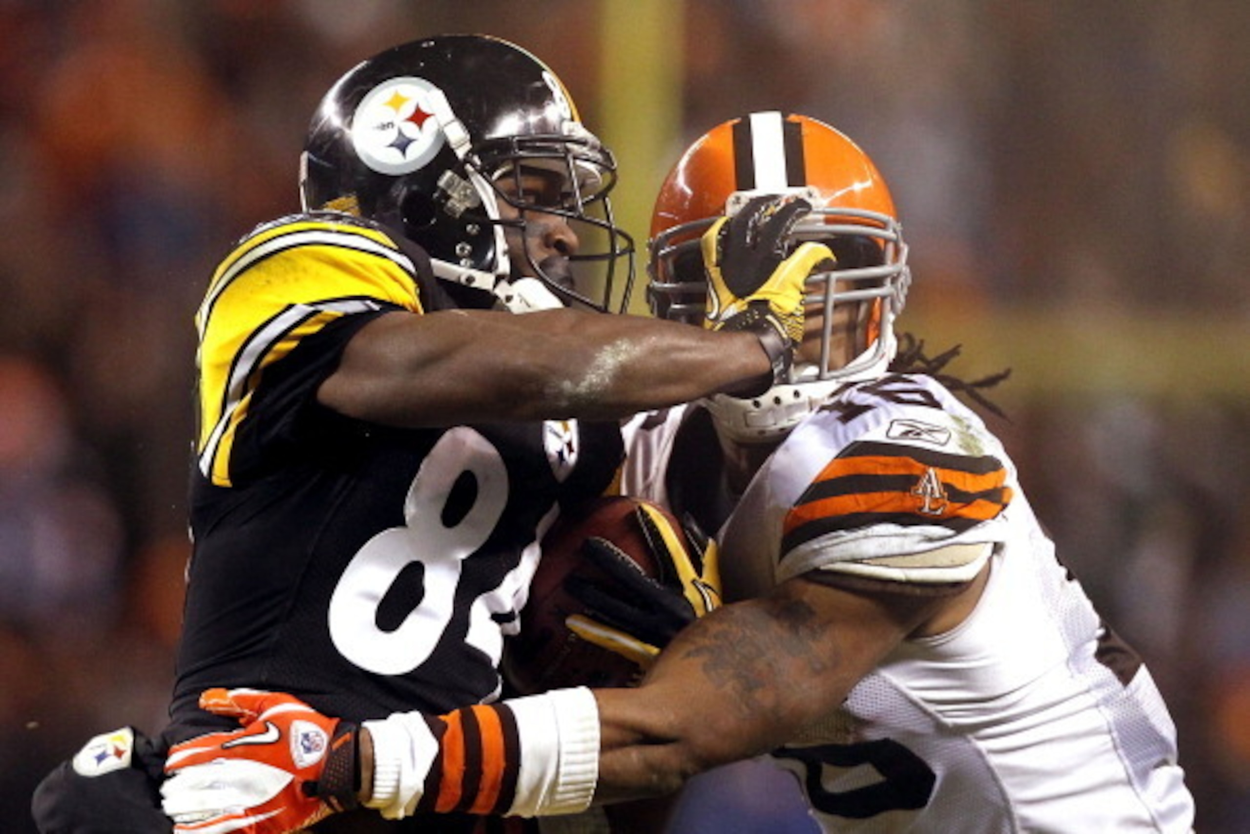 CLEVELAND, OH - JANUARY 01: Wide receiver Antonio Brown #84 of the Pittsburgh Steelers pushes wide receiver Joshua Cribbs #16 of the Cleveland Browns at Cleveland Browns Stadium on January 1, 2012 in Cleveland, Ohio. (Photo by Matt Sullivan/Getty Images) CLEVELAND, OH - JANUARY 01: Wide receiver Antonio Brown #84 of the Pittsburgh Steelers pushes wide receiver Joshua Cribbs #16 of the Cleveland Browns at Cleveland Browns Stadium on January 1, 2012 in Cleveland, Ohio. (Photo by Matt Sullivan/Getty Images)