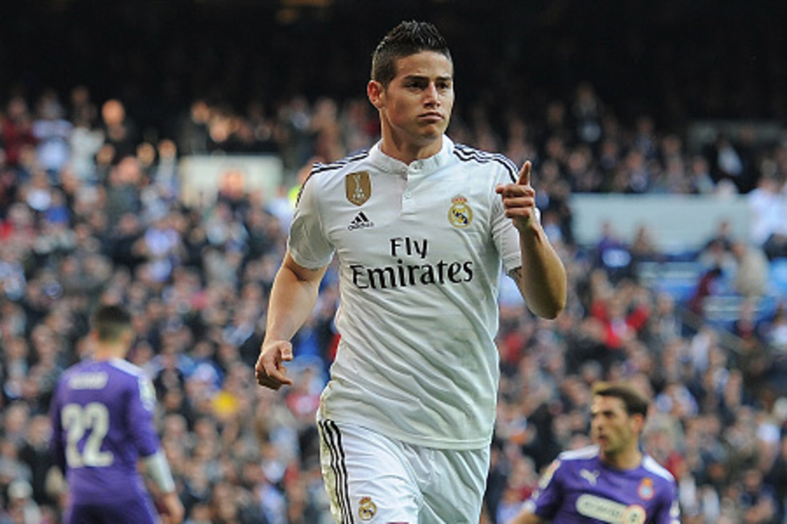 MADRID, SPAIN - JANUARY 10:  James Rodriguez of Real Madrid celebrates after scoring Real's opening goal during the La Liga match between Real Madrid CF and RCD Espanyol at Estadio Santiago Bernabeu on January 10, 2015 in Madrid, Spain.  (Photo by Denis D