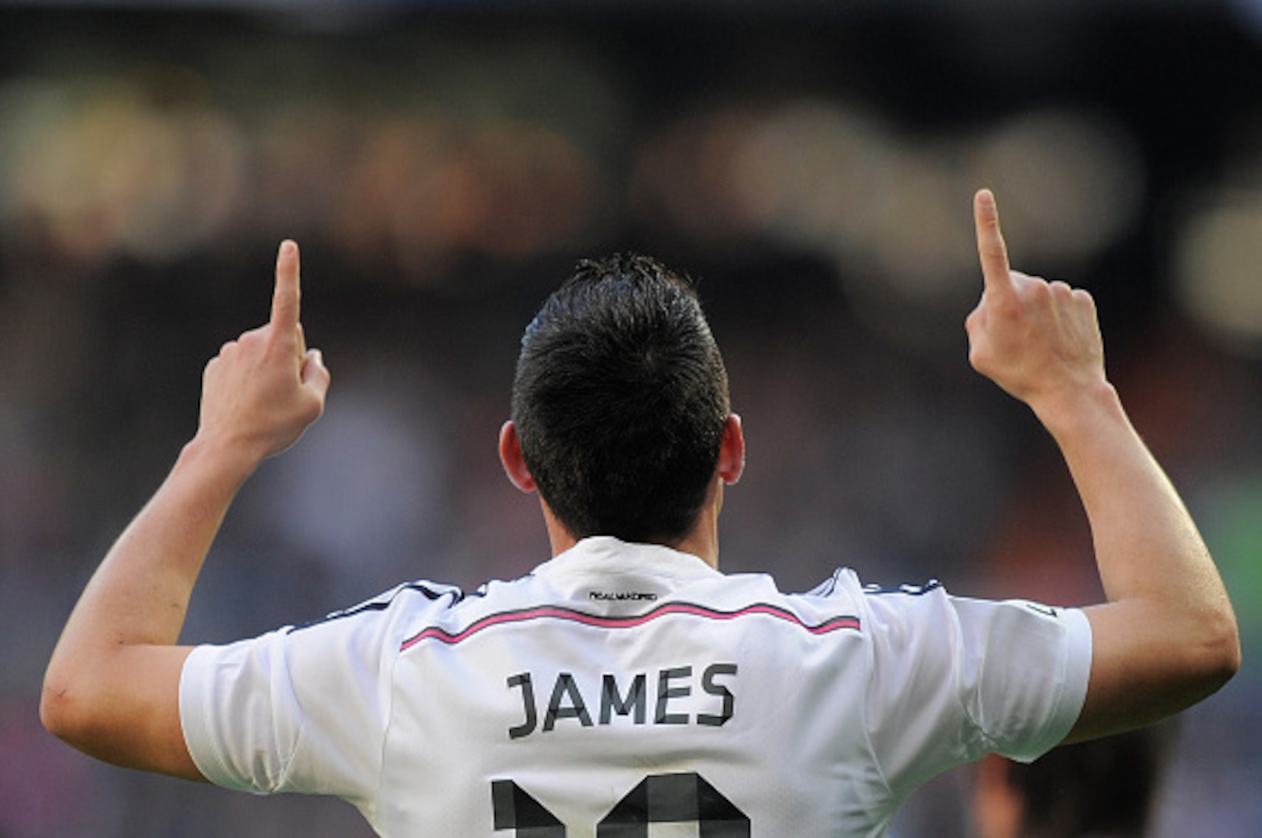 MADRID, SPAIN - JANUARY 10:  James Rodriguez of Real Madrid celebrates after scoring Real's opening goal during the La Liga match between Real Madrid CF and RCD Espanyol at Estadio Santiago Bernabeu on January 10, 2015 in Madrid, Spain.  (Photo by Denis D