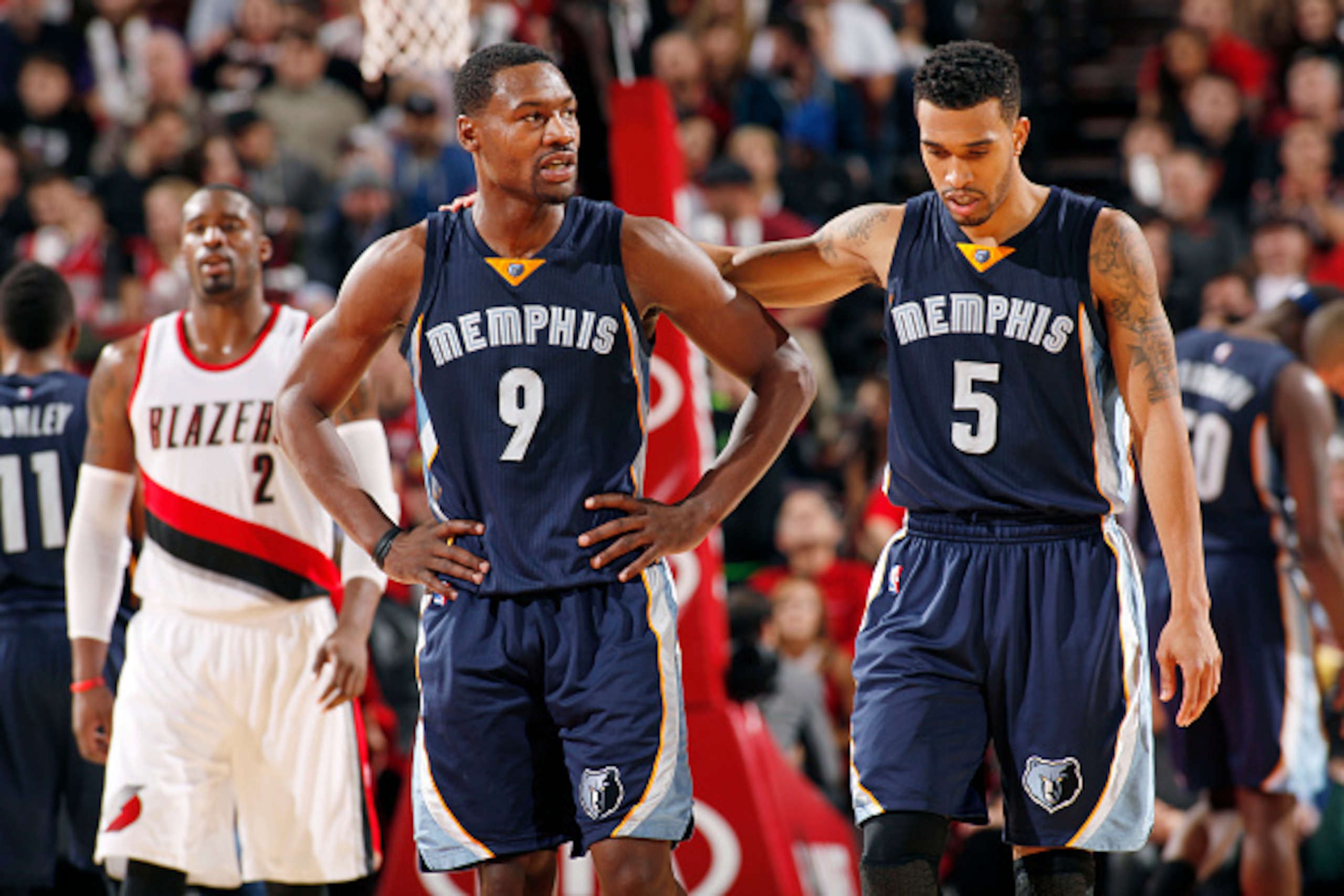 PORTLAND, OR - NOVEMBER 28: Tony Allen #9 and Courtney Lee #5 of the Memphis Grizzlies during the game against the Portland Trail Blazers on November 28, 2014 at Moda Center in Portland, Oregon. NOTE TO USER: User expressly acknowledges and agrees that, PORTLAND, OR - NOVEMBER 28: Tony Allen #9 and Courtney Lee #5 of the Memphis Grizzlies during the game against the Portland Trail Blazers on November 28, 2014 at Moda Center in Portland, Oregon. NOTE TO USER: User expressly acknowledges and agrees that,
