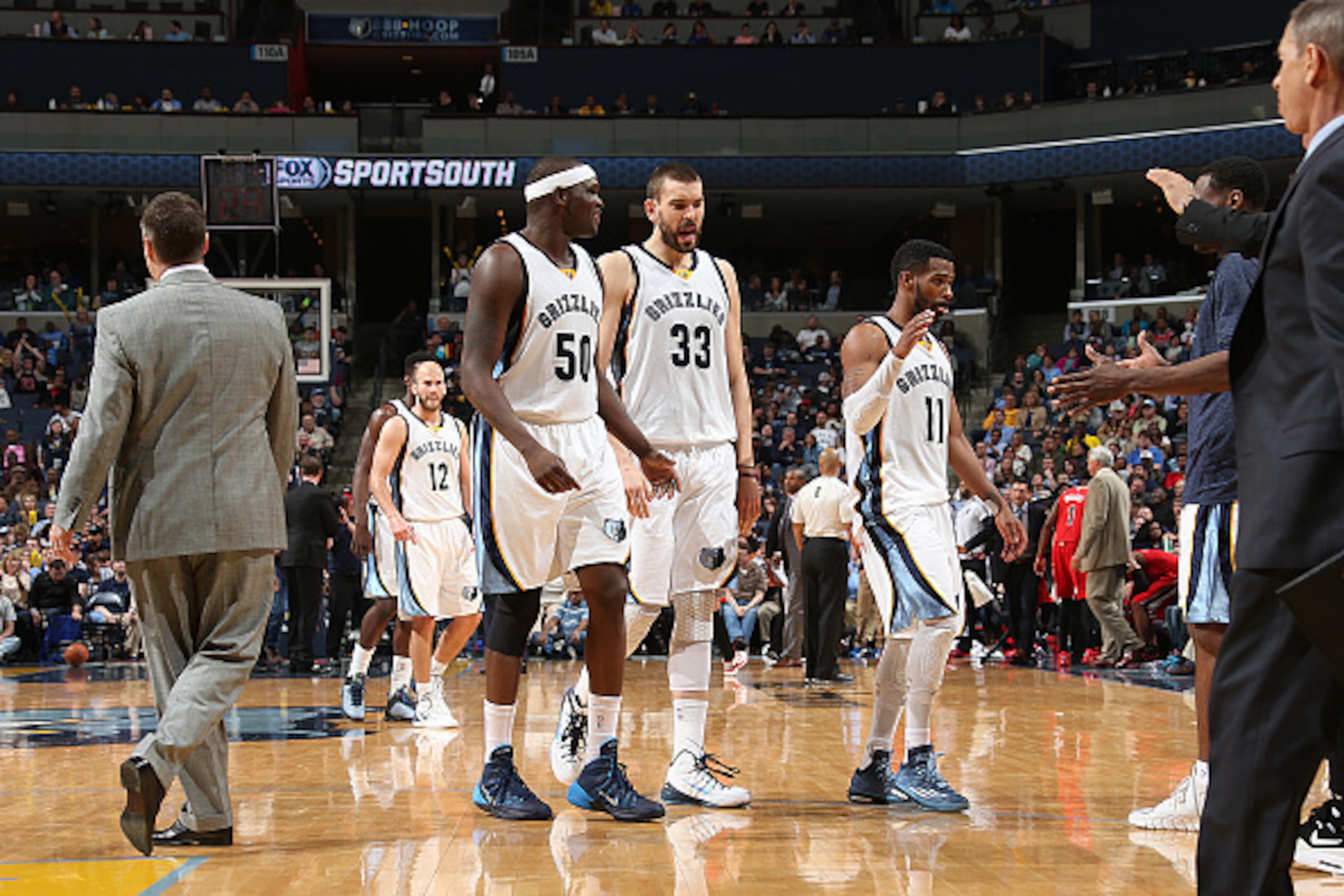 MEMPHIS, TN - MARCH 21: Zach Randolph #50, Marc Gasol #33 and Mike Conley #11 of the Memphis Grizzlies celebrate during the game against the Portland Trail Blazers on March 21, 2015 at FedExForum in Memphis, Tennessee. NOTE TO USER: User expressly acknow MEMPHIS, TN - MARCH 21: Zach Randolph #50, Marc Gasol #33 and Mike Conley #11 of the Memphis Grizzlies celebrate during the game against the Portland Trail Blazers on March 21, 2015 at FedExForum in Memphis, Tennessee. NOTE TO USER: User expressly acknow