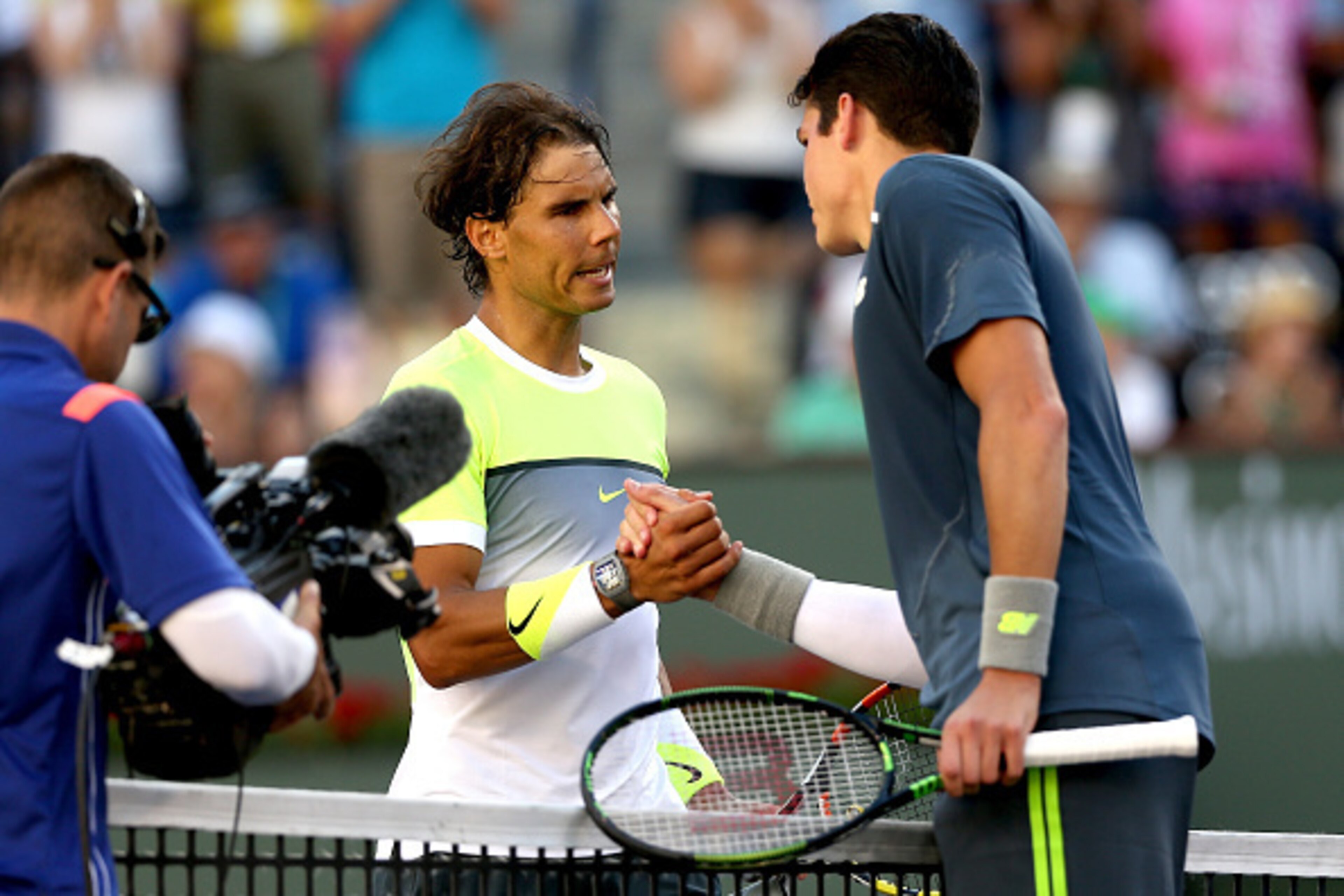 INDIAN WELLS, CA - MARCH 20:  Rafael Nadal of Spain congratulates Milos Roanic of Canada after their match during day twelve of the BNP Paribas Open at the Indian Wells Tennis Garden on March 20, 2015 in Indian Wells, California.  (Photo by Matthew Stockm