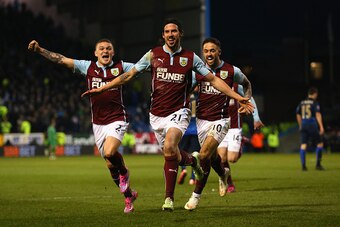 BURNLEY, ENGLAND - MARCH 14:  George Boyd of Burnley (C) celebrates scoring the opening goal  during the Barclays Premier League match between Burnley and Manchester City at Turf Moor on March 14, 2015 in Burnley, England.  (Photo by Alex Livesey/Getty Im