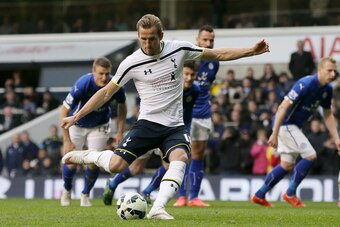 Kane completed his hat-trick against Leicester by firing a penalty past Kasper Schmeichel.