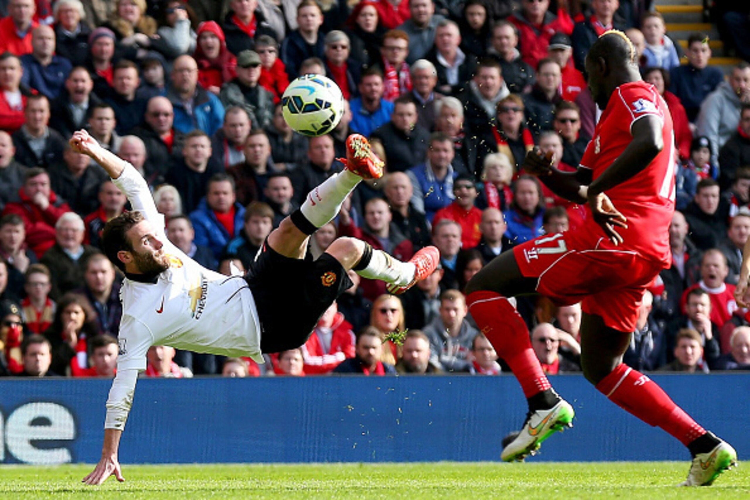 LIVERPOOL, ENGLAND - MARCH 22: Juan Mata of Manchester United scores his second goal during the Barclays Premier League match between Liverpool and Manchester United at Anfield on March 22, 2015 in Liverpool, England. (Photo by Alex Livesey/Getty Images)