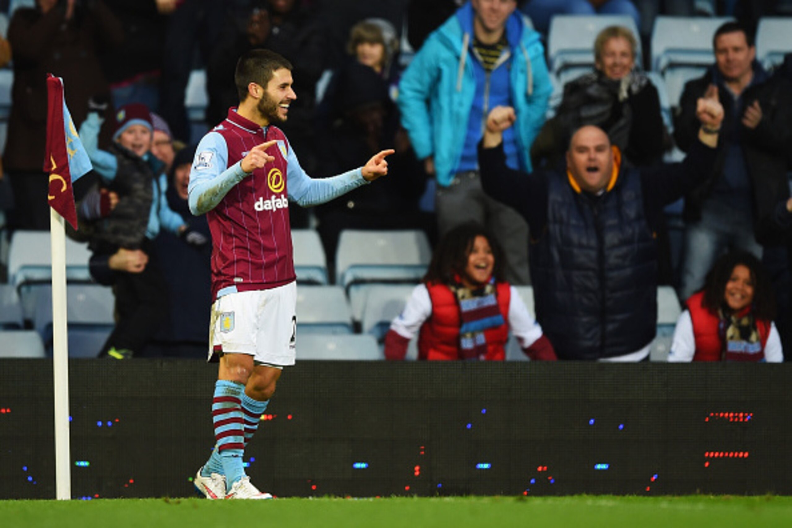 BIRMINGHAM, ENGLAND - JANUARY 25:  Carles Gil of Aston Villa celebrates scoring the opening goal during the FA Cup Fourth Round match between Aston Villa and AFC Bournemouth at Villa Park on January 25, 2015 in Birmingham, England.  (Photo by Shaun Botter