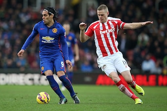 STOKE ON TRENT, ENGLAND - JANUARY 01:  Radamel Falcao of Manchester United competes with Ryan Shawcross of Stoke City during the Barclays Premier League match between Stoke City and Manchester United at Britannia Stadium on January 1, 2015 in Stoke on Tre