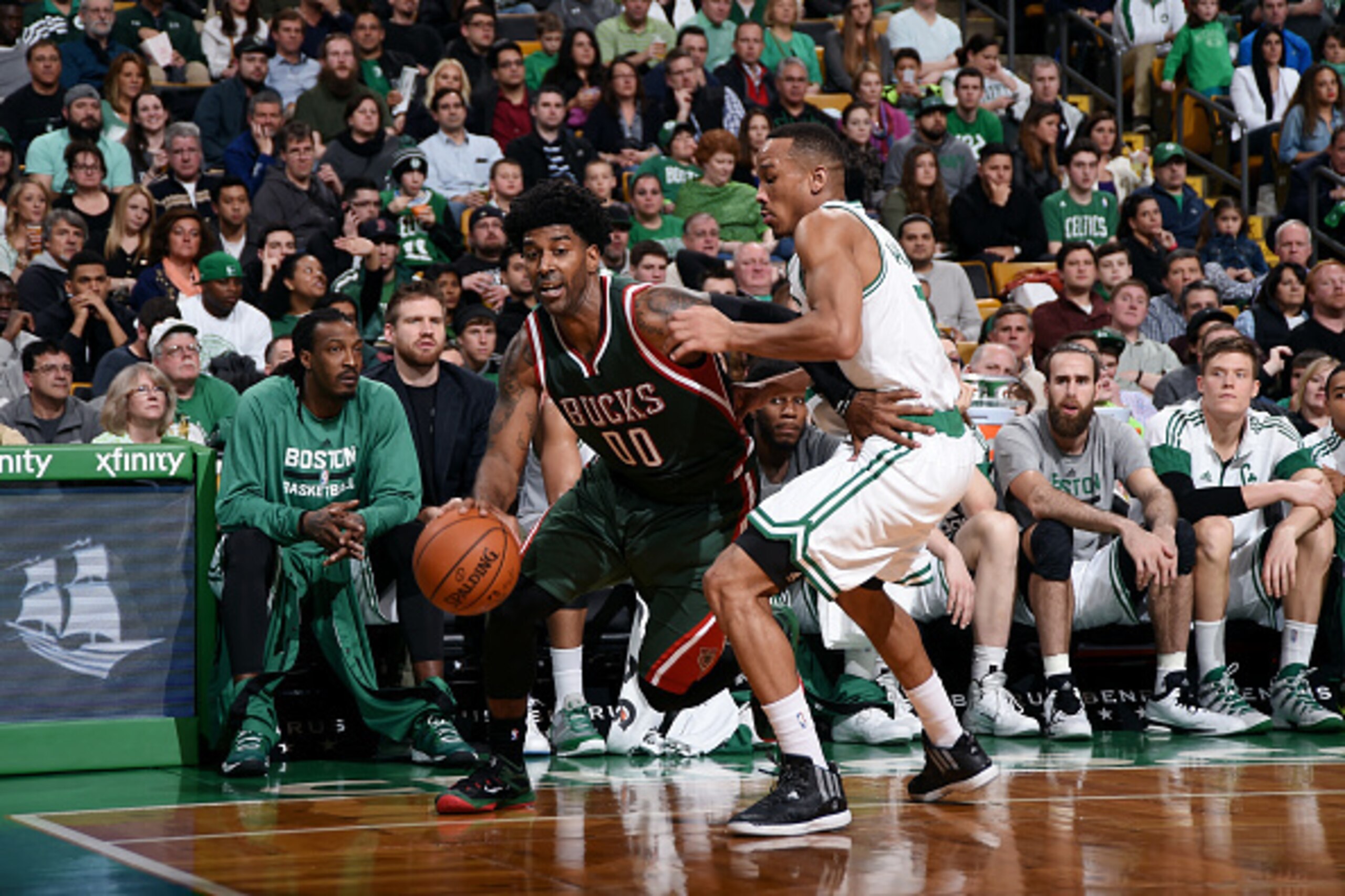 BOSTON, MA - APRIL 3: O.J. Mayo #00 of the Milwaukee Bucks drives against Jared Sullinger #7 of the Boston Celtics on April 3, 2015 at TD Garden in Boston, Massachusetts. NOTE TO USER: User expressly acknowledges and agrees that, by downloading and or us BOSTON, MA - APRIL 3: O.J. Mayo #00 of the Milwaukee Bucks drives against Jared Sullinger #7 of the Boston Celtics on April 3, 2015 at TD Garden in Boston, Massachusetts. NOTE TO USER: User expressly acknowledges and agrees that, by downloading and or us