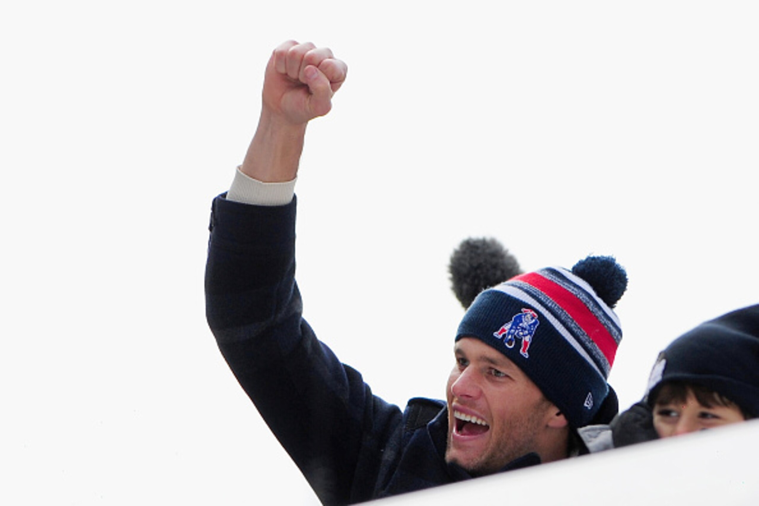 BOSTON, MA - FEBRUARY 04:  Quarterback Tom Brady of the New England Patriots celebrates during a Super Bowl victory parade on February 4, 2015 in Boston, Massachusetts. The Patriots defeated the Seattle Seahawks 28-24 in Super Bowl XLIX. (Photo by Billie 