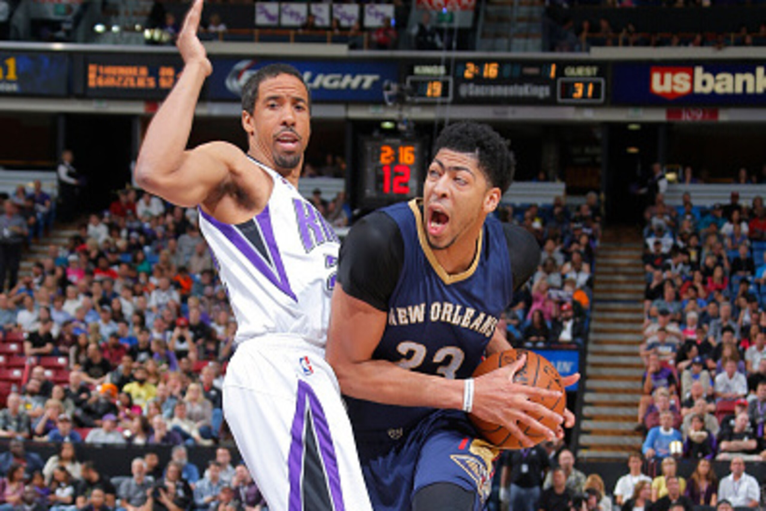 SACRAMENTO, CA - APRIL 3: Anthony Davis #23 of the New Orleans Pelicans drives against Andre Miller #22 of the Sacramento Kings on April 3, 2015 at Sleep Train Arena in Sacramento, California. NOTE TO USER: User expressly acknowledges and agrees that, by SACRAMENTO, CA - APRIL 3: Anthony Davis #23 of the New Orleans Pelicans drives against Andre Miller #22 of the Sacramento Kings on April 3, 2015 at Sleep Train Arena in Sacramento, California. NOTE TO USER: User expressly acknowledges and agrees that, by