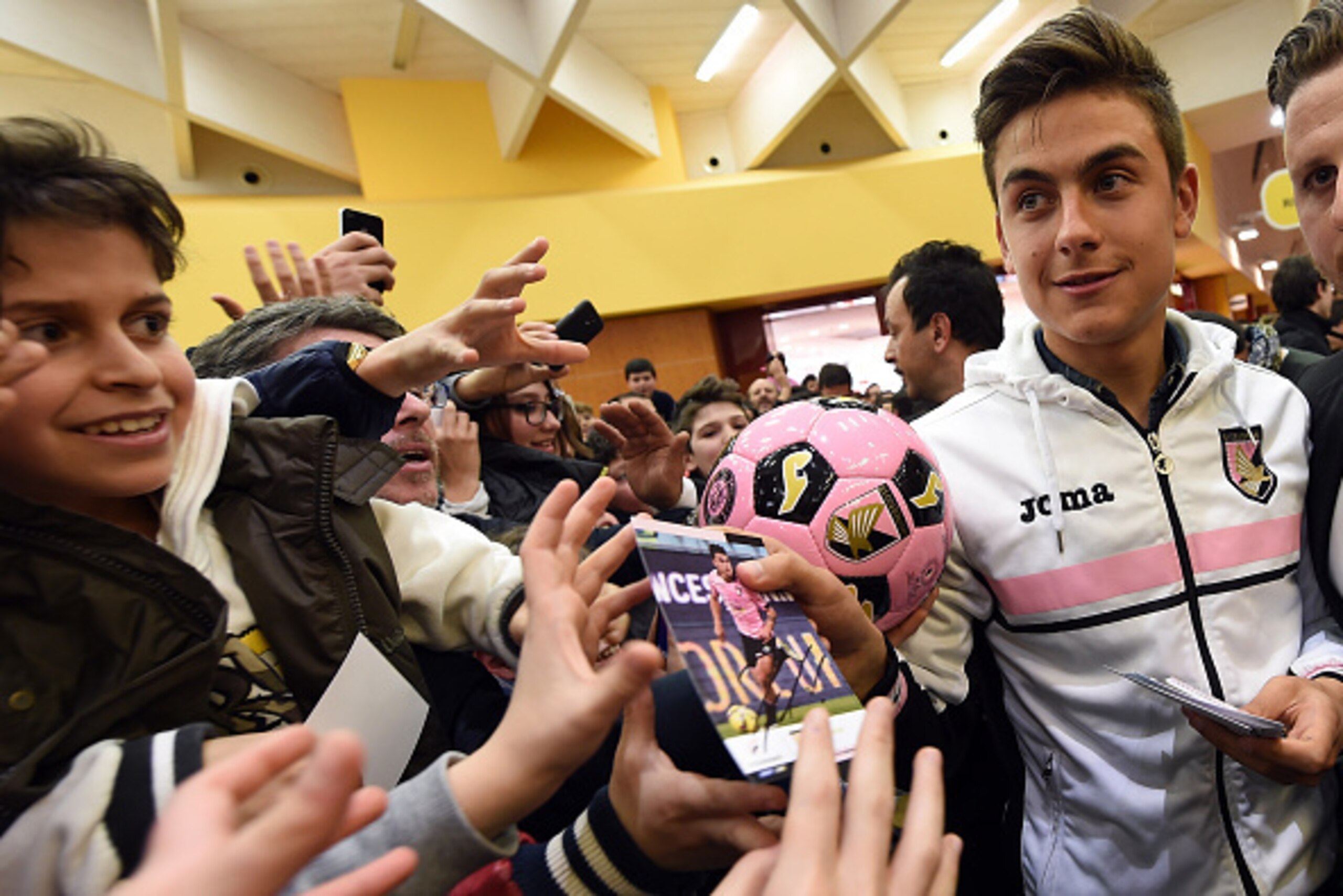 PALERMO, ITALY - MARCH 24:  Paulo Dybala of US Citta di Palermo meets supporters at Palermo Store at Conca D'Oro Shopping Center on March 24, 2015 in Palermo, Italy.  (Photo by Tullio M. Puglia/Getty Images)