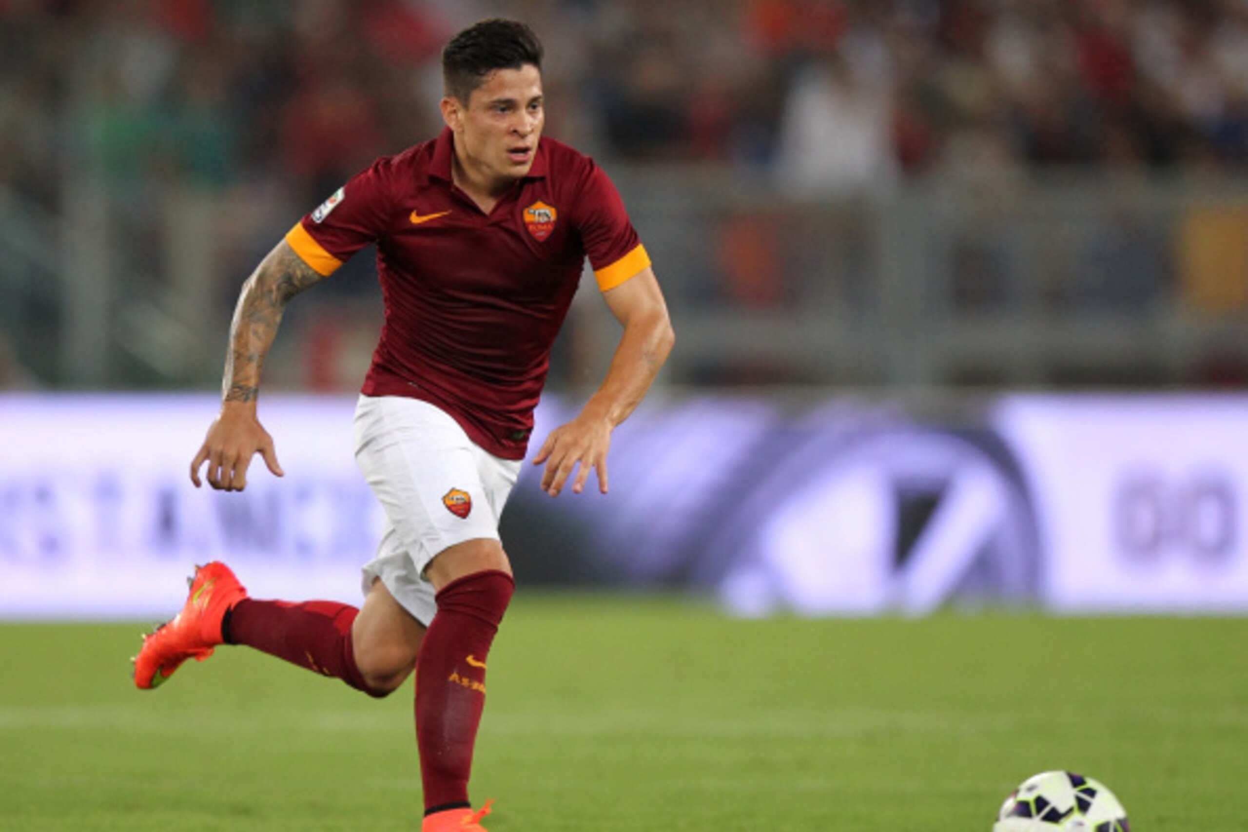 ROME, ITALY - AUGUST 30:  Juan Manuel Iturbe of AS Roma in action during the Serie A match between AS Roma and ACF Fiorentina at Stadio Olimpico on August 30, 2014 in Rome, Italy.  (Photo by Paolo Bruno/Getty Images)