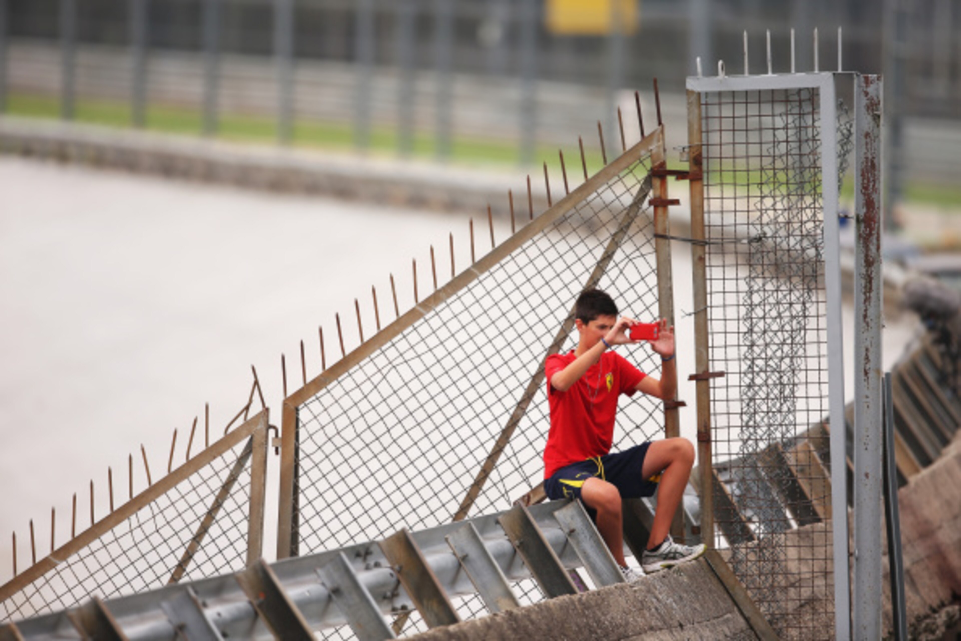 MONZA, ITALY - SEPTEMBER 05: A Ferrari fan takes a 'Selfie' during Practice ahead of the F1 Grand Prix of Italy at Autodromo di Monza on September 5, 2014 in Monza, Italy. (Photo by Bryn Lennon/Getty Images) MONZA, ITALY - SEPTEMBER 05: A Ferrari fan takes a 'Selfie' during Practice ahead of the F1 Grand Prix of Italy at Autodromo di Monza on September 5, 2014 in Monza, Italy. (Photo by Bryn Lennon/Getty Images)