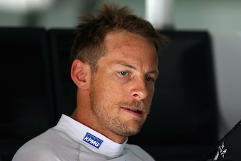 KUALA LUMPUR, MALAYSIA - MARCH 28:  Jenson Button of Great Britain and McLaren Honda looks on in the garage during final practice for the Malaysia Formula One Grand Prix at Sepang Circuit on March 28, 2015 in Kuala Lumpur, Malaysia.  (Photo by Clive Mason