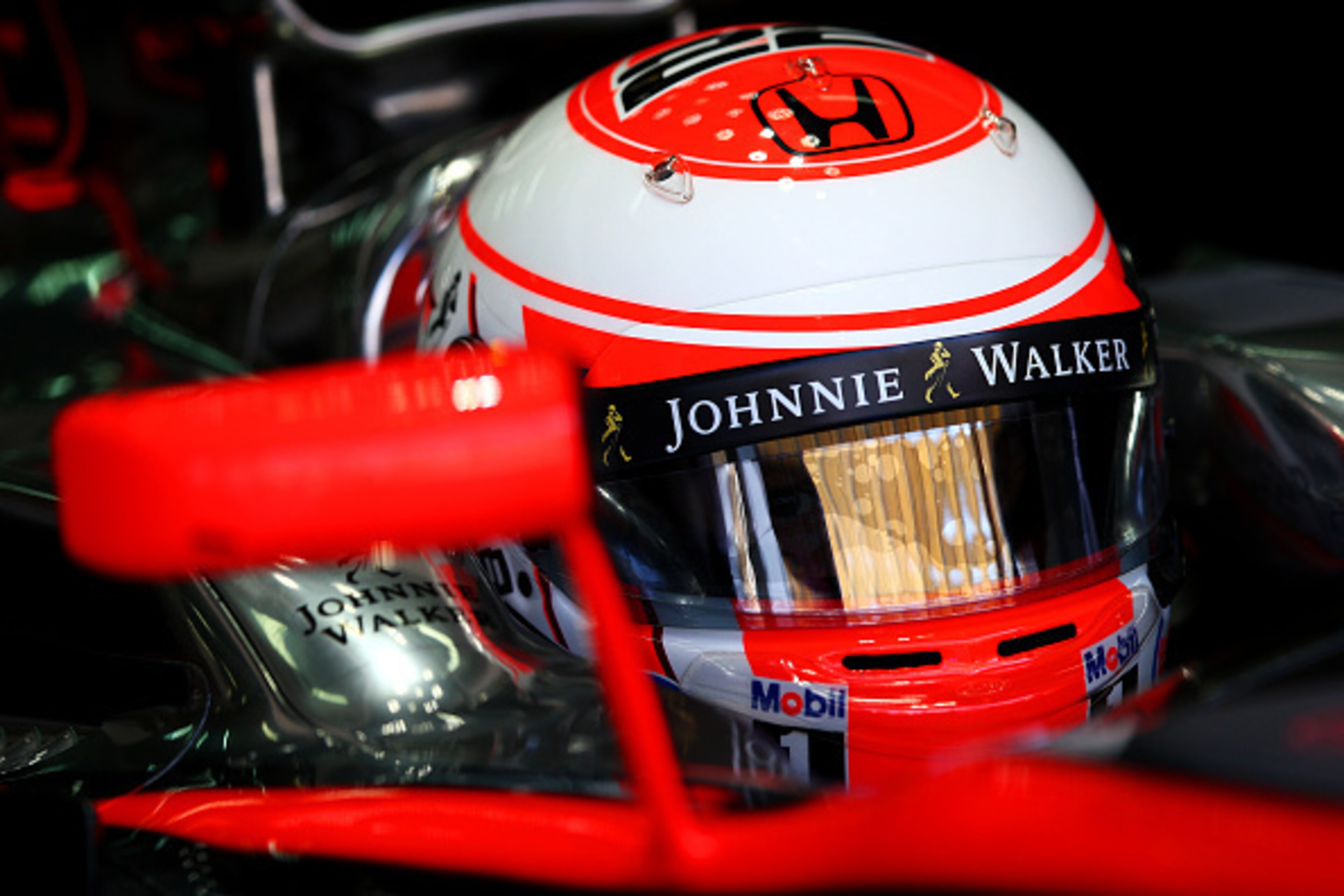 KUALA LUMPUR, MALAYSIA - MARCH 27: Jenson Button of Great Britain and McLaren Honda sits in his car during practice for the Malaysia Formula One Grand Prix at Sepang Circuit on March 27, 2015 in Kuala Lumpur, Malaysia. (Photo by Mark Thompson/Getty Imag KUALA LUMPUR, MALAYSIA - MARCH 27: Jenson Button of Great Britain and McLaren Honda sits in his car during practice for the Malaysia Formula One Grand Prix at Sepang Circuit on March 27, 2015 in Kuala Lumpur, Malaysia. (Photo by Mark Thompson/Getty Imag