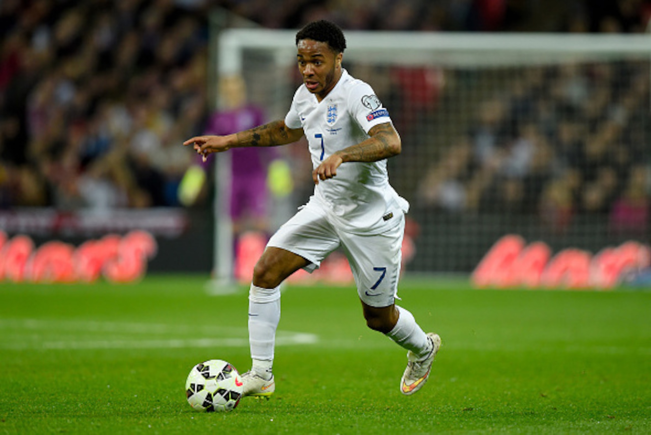 LONDON, ENGLAND - MARCH 27:  Raheem Sterling of England runs with the ball during the EURO 2016 Qualifier match between England and Lithuania at Wembley Stadium on March 27, 2015 in London, England.  (Photo by Mike Hewitt/Getty Images)