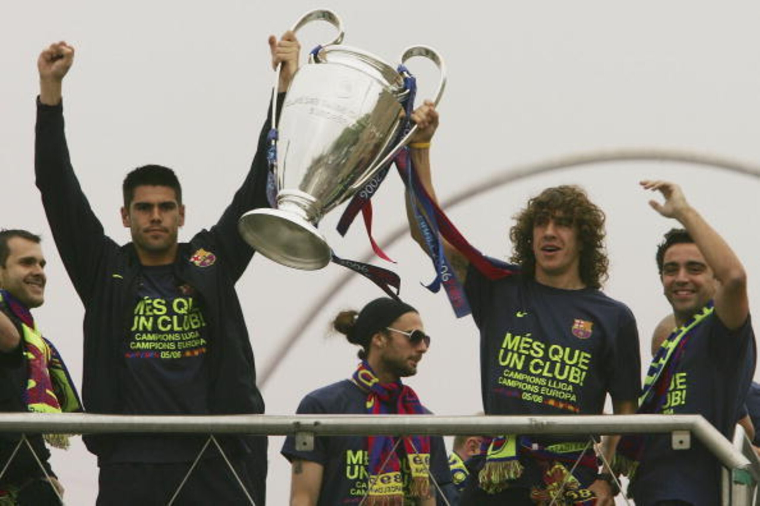 BARCELONA, SPAIN - MAY 18:  Victor Valdez (L) and Carles Puyol celebrate from an open roof vehicle after Barcelona won the UEFA Champions League final on May 18 ,2006 in central Barcelona, Spain.  (Photo by Denis Doyle/Getty Images)
