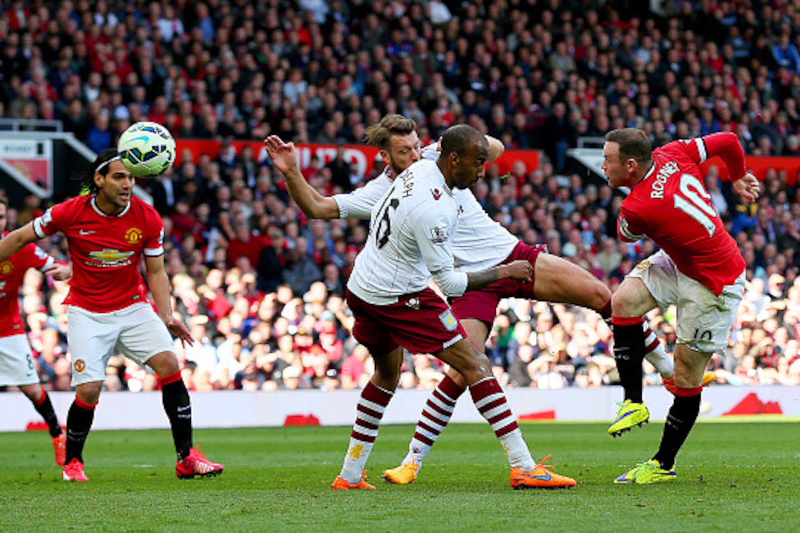 MANCHESTER, ENGLAND - APRIL 04: Wayne Rooney of Manchester United scores his team's second goal during the Barclays Premier League match between Manchester United and Aston Villa at Old Trafford on April 4, 2015 in Manchester, England. (Photo by Alex Li MANCHESTER, ENGLAND - APRIL 04: Wayne Rooney of Manchester United scores his team's second goal during the Barclays Premier League match between Manchester United and Aston Villa at Old Trafford on April 4, 2015 in Manchester, England. (Photo by Alex Li