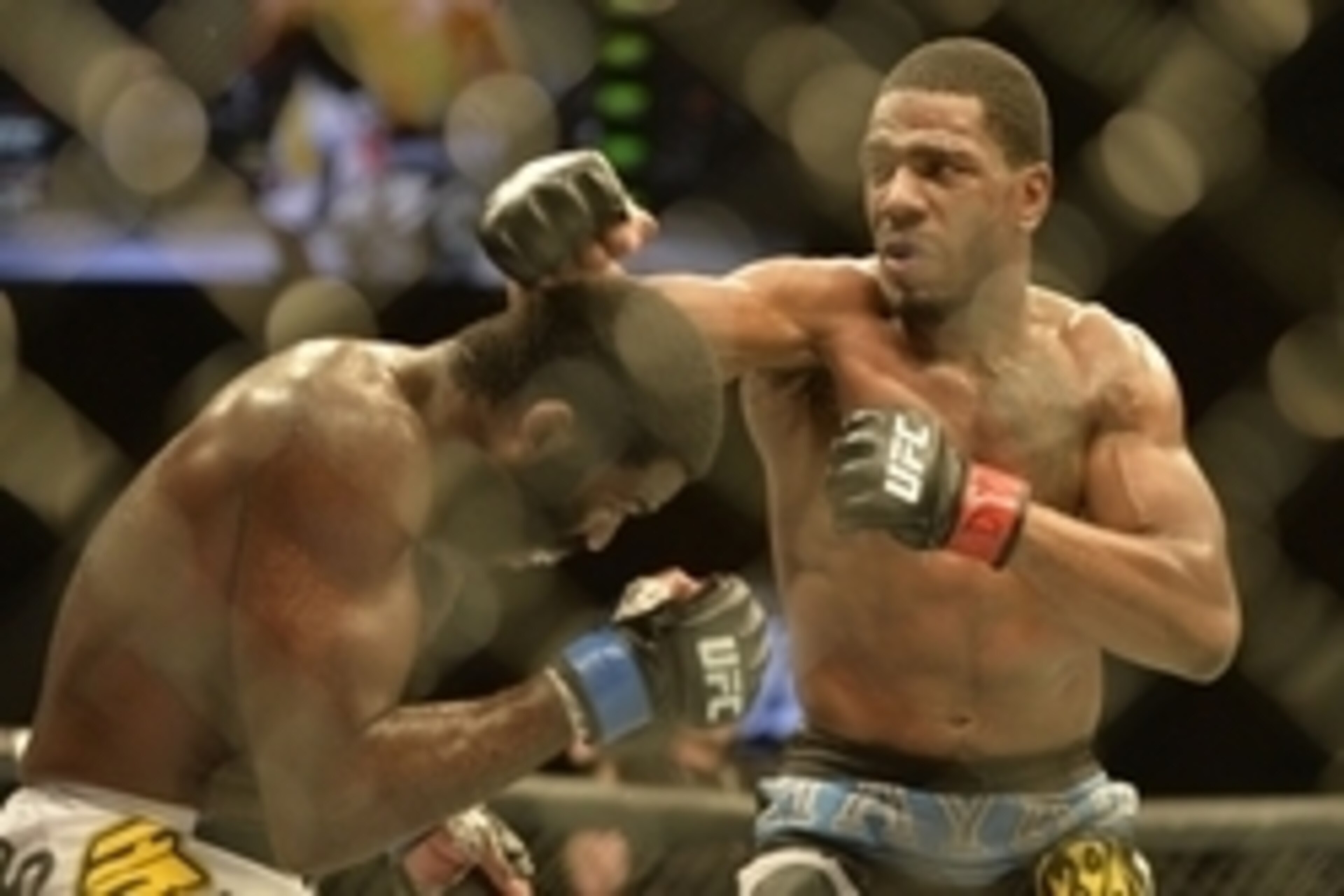 Apr 4, 2015; Fairfax, VA, USA; Ron Stallings (red gloves) fights Justin Jones (blue gloves) during UFC Fight Night at Patriot Center. Mandatory Credit: Tommy Gilligan-USA TODAY Sports