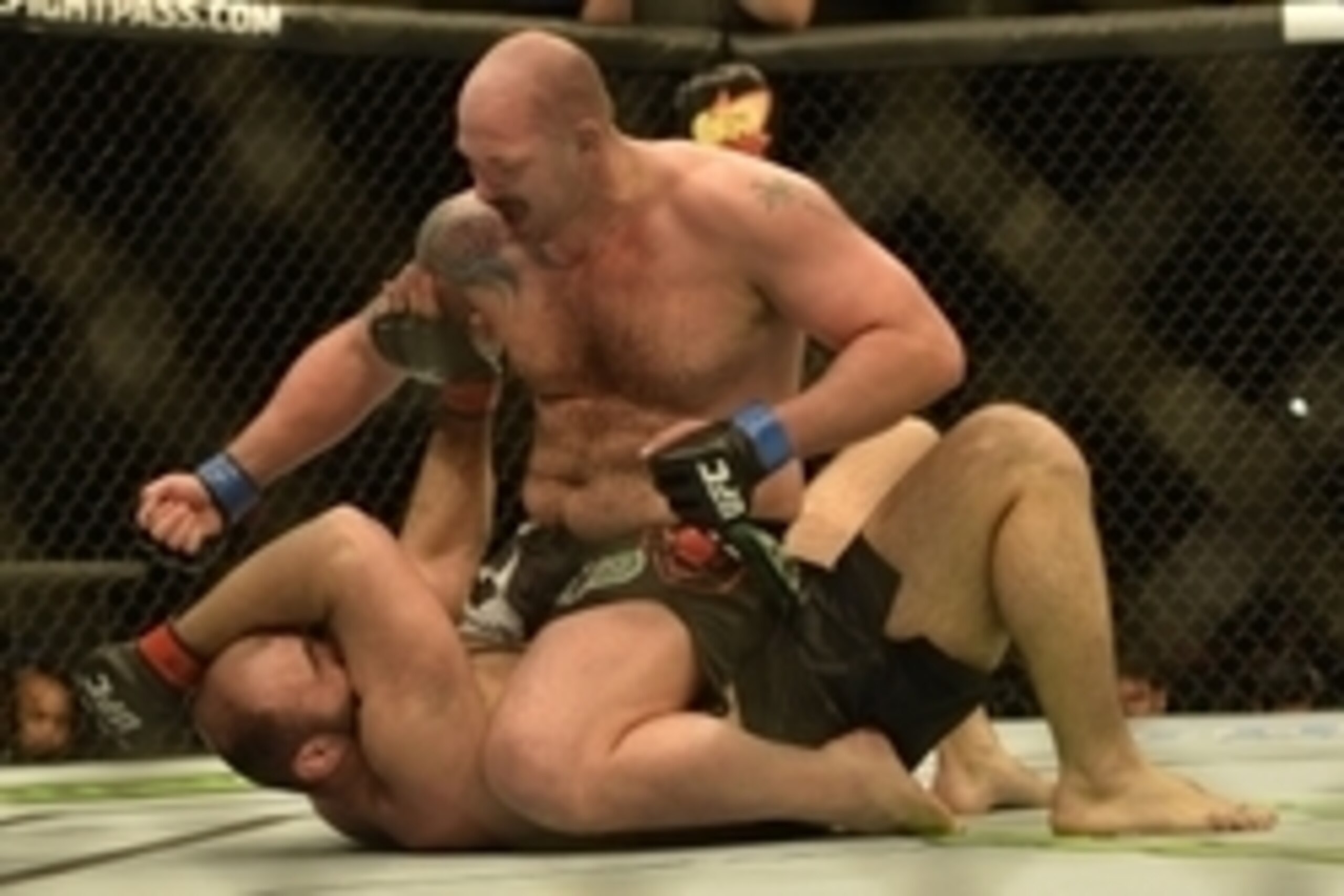Apr 4, 2015; Fairfax, VA, USA; Timothy Johnson (blue gloves) fights Shamil Abdurakhimov (red gloves) during UFC Fight Night at Patriot Center. Mandatory Credit: Tommy Gilligan-USA TODAY Sports