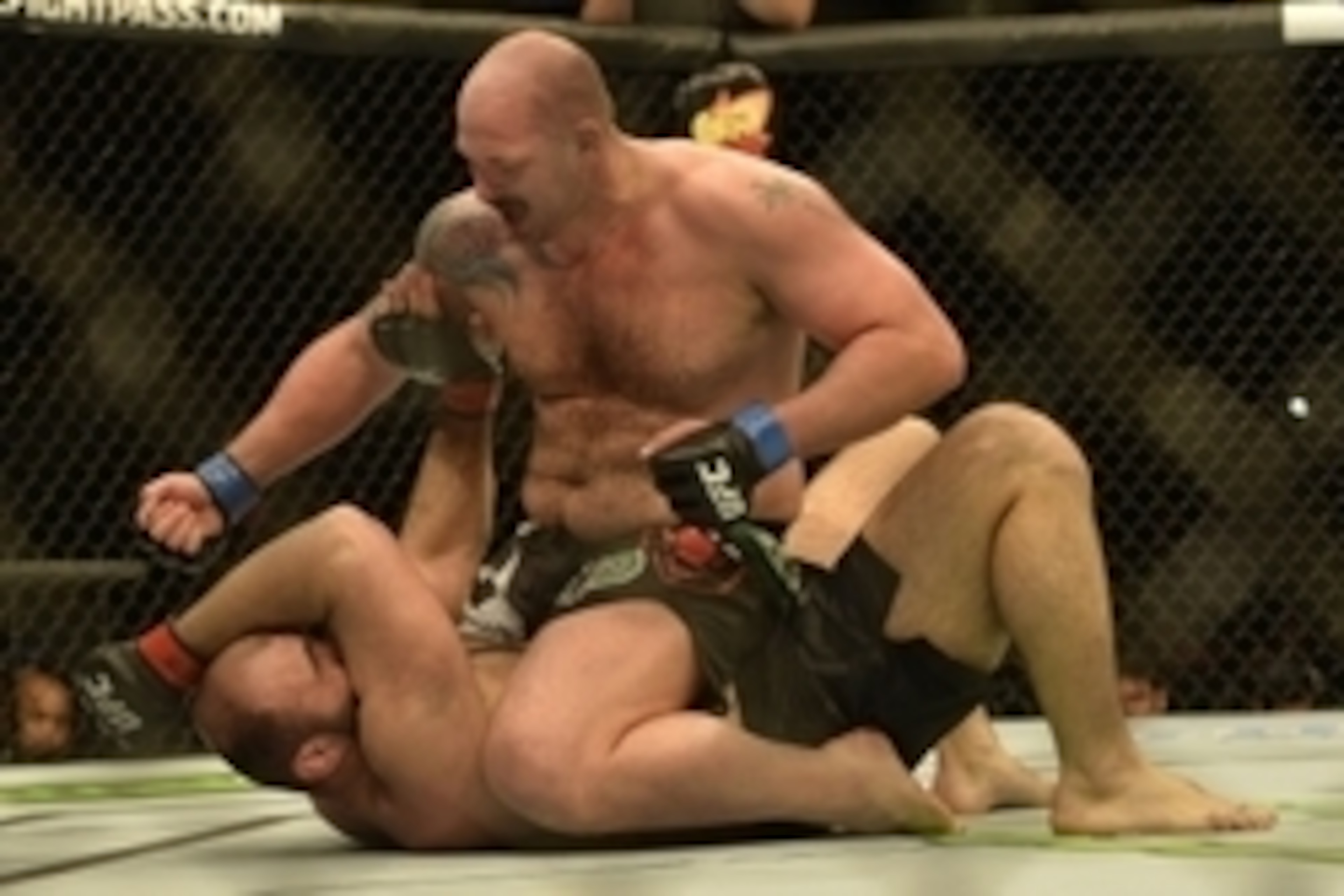 Apr 4, 2015; Fairfax, VA, USA; Timothy Johnson (blue gloves) fights Shamil Abdurakhimov (red gloves) during UFC Fight Night at Patriot Center. Mandatory Credit: Tommy Gilligan-USA TODAY Sports