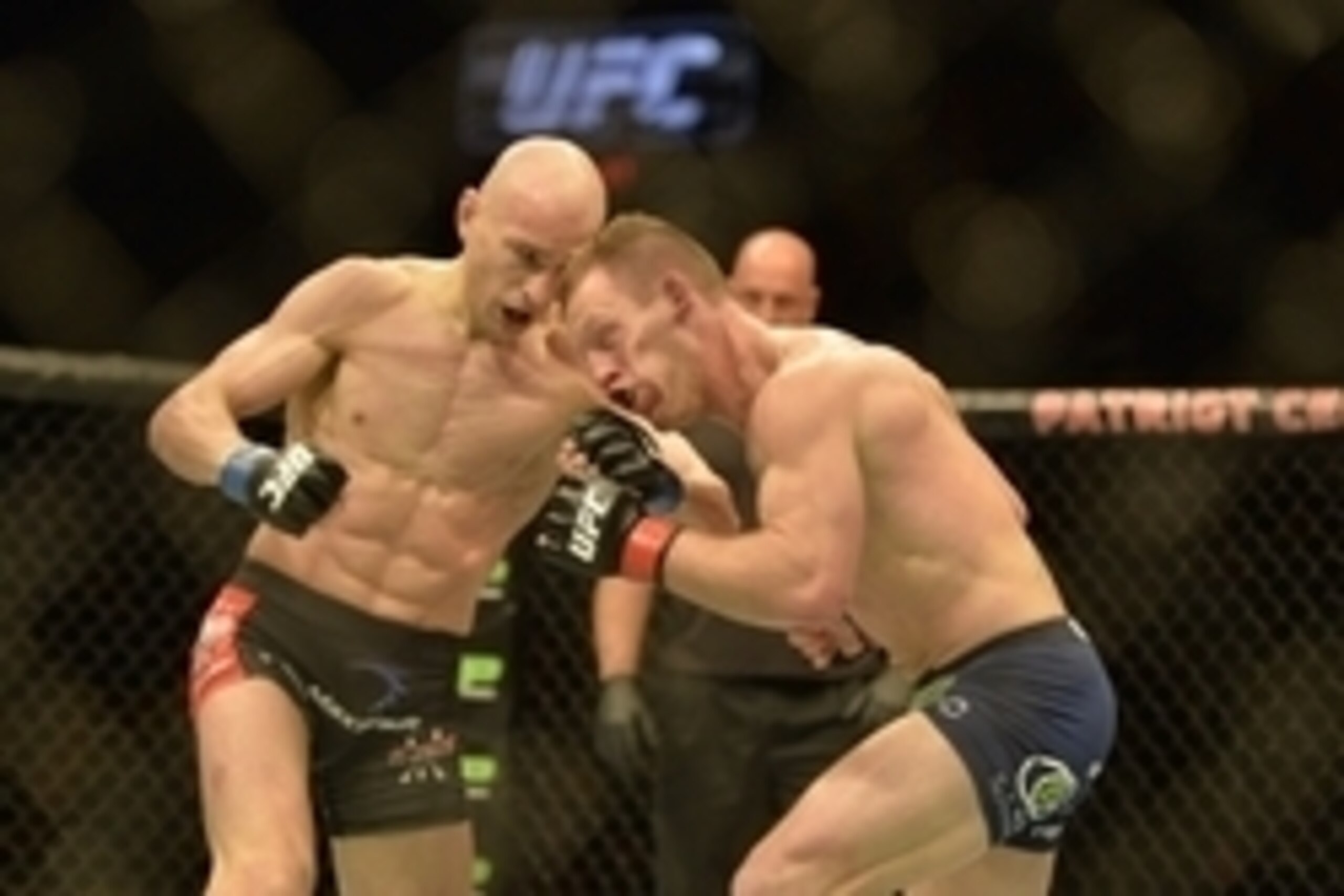 Apr 4, 2015; Fairfax, VA, USA; Alexander Yakovlev (blue gloves) fights Gray Maynard (red gloves) during UFC Fight Night at Patriot Center. Mandatory Credit: Tommy Gilligan-USA TODAY Sports