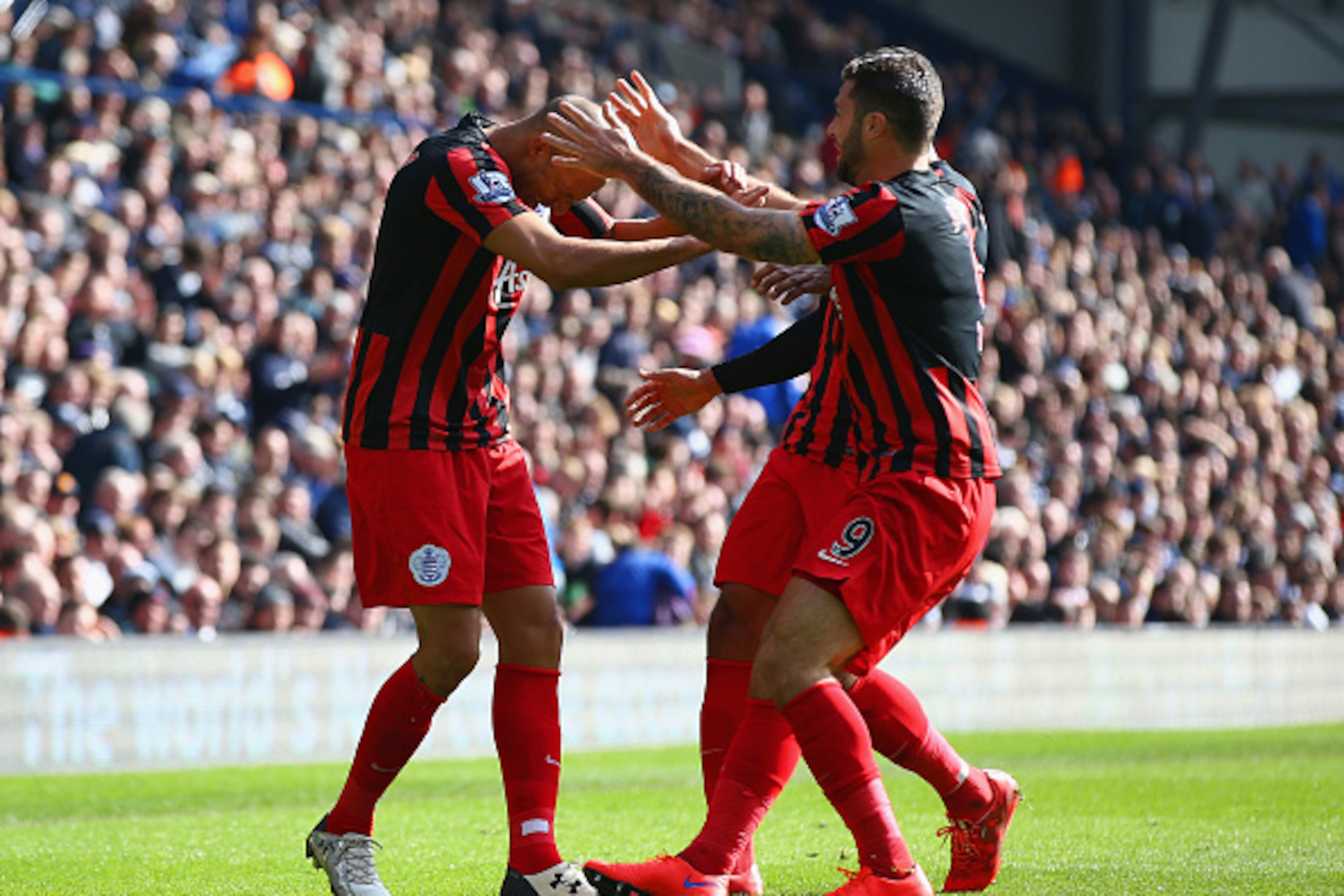 WEST BROMWICH, ENGLAND - APRIL 04:  Bobby Zamora of QPR (L) celebrates scoring their third goal with Charlie Austin of QPR during the Barclays Premier league match West Bromwich Albion and Queens Park Rangers at The Hawthorns on April 4, 2015 in West Brom