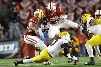 MADISON, WI - NOVEMBER 29: Melvin Gordon #25 of the Wisconsin Badgers runs with the football during the second half against the Minnesota Golden Gophers at Camp Randall Stadium on November 29, 2014 in Madison, Wisconsin. (Photo by Mike McGinnis/Getty Imag