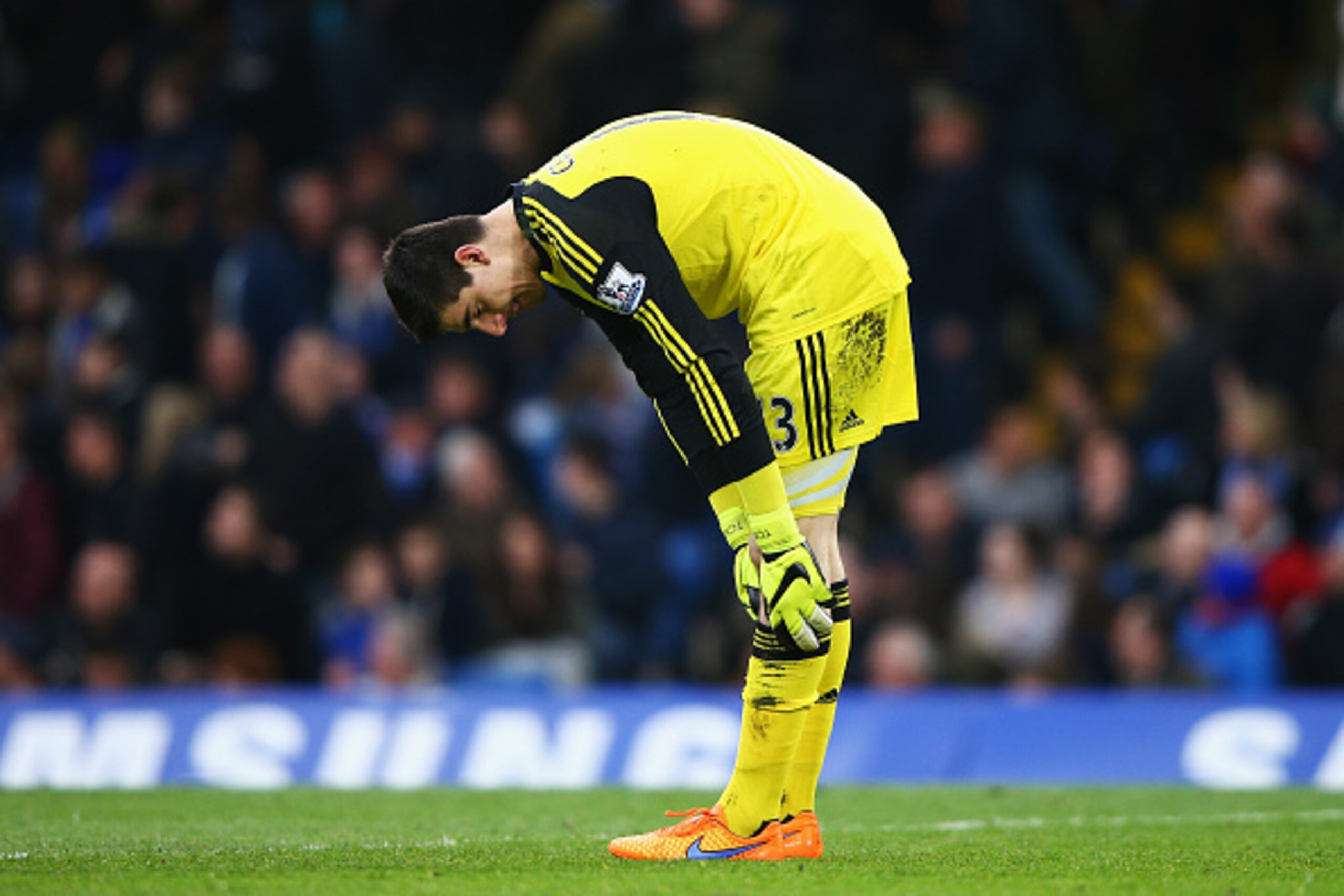LONDON, ENGLAND - APRIL 04:  Thibaut Courtois of Chelsea reacts after conceding a goal scored by Charlie Adam of Stoke City during the Barclays Premier League match between Chelsea and Stoke City at Stamford Bridge on April 4, 2015 in London, England.  (P