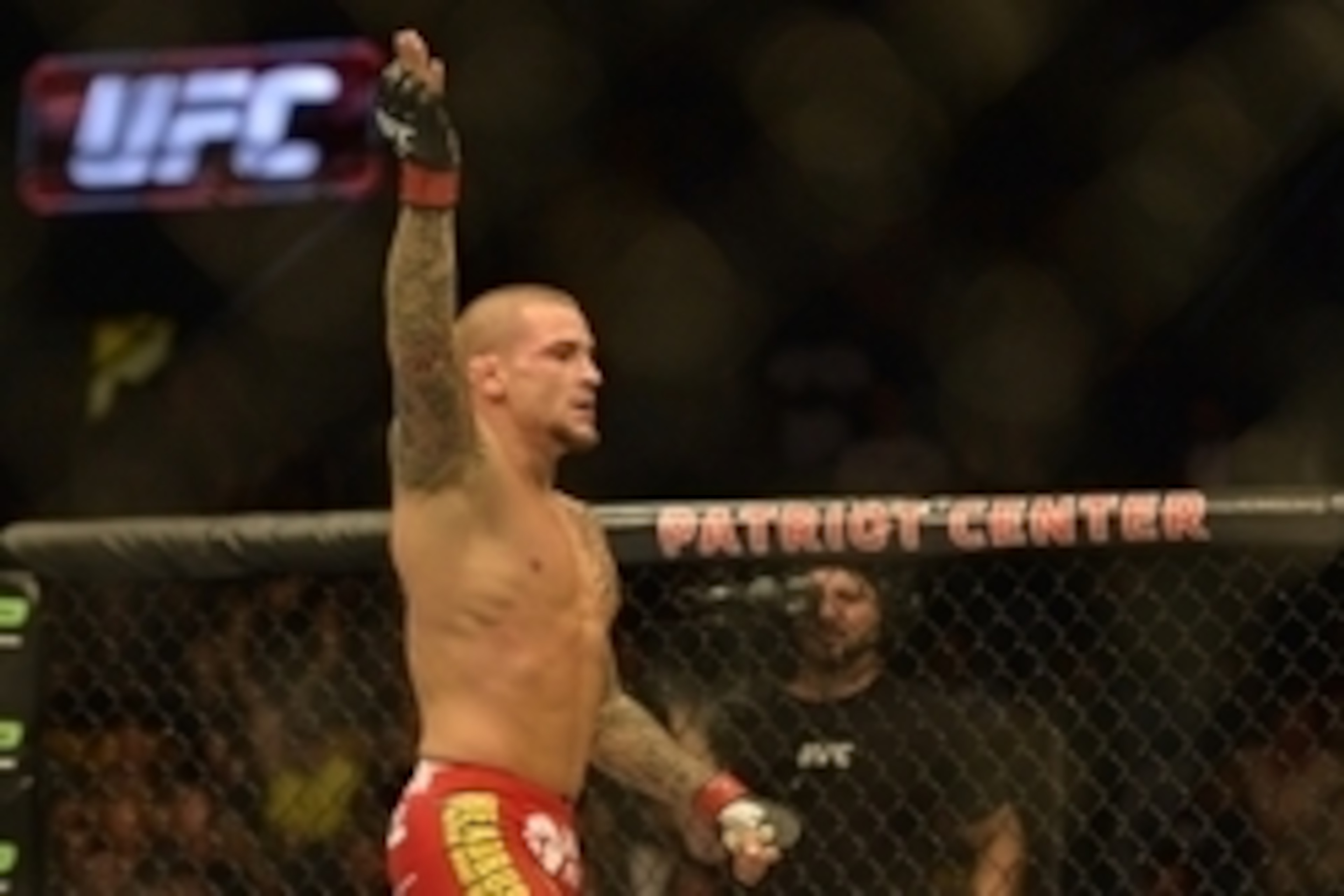 Apr 4, 2015; Fairfax, VA, USA; Dustin Poirier (red gloves) celebrates after the first round of a technical knock out against Diego Ferreira (not pictured) during UFC Fight Night at Patriot Center. Mandatory Credit: Tommy Gilligan-USA TODAY Sports