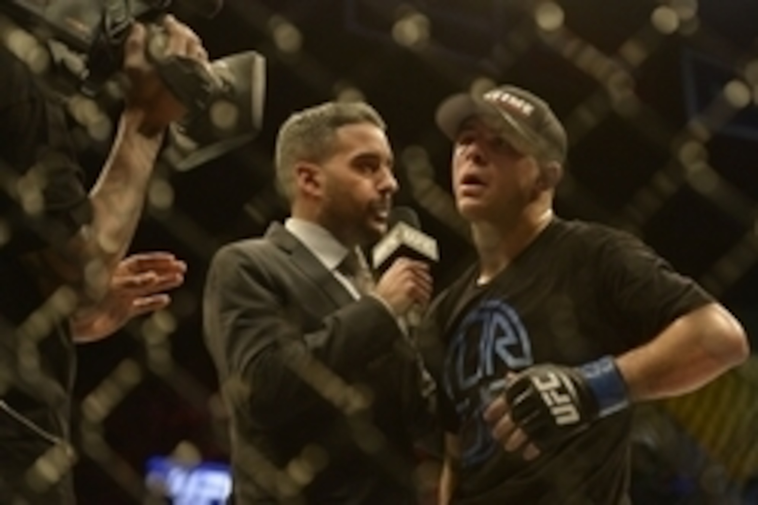 Apr 4, 2015; Fairfax, VA, USA; Al Iaquinta (blue gloves) speaks to the media after defeating Jorge Masvidal (not pictured) during UFC Fight Night at Patriot Center. Mandatory Credit: Tommy Gilligan-USA TODAY Sports