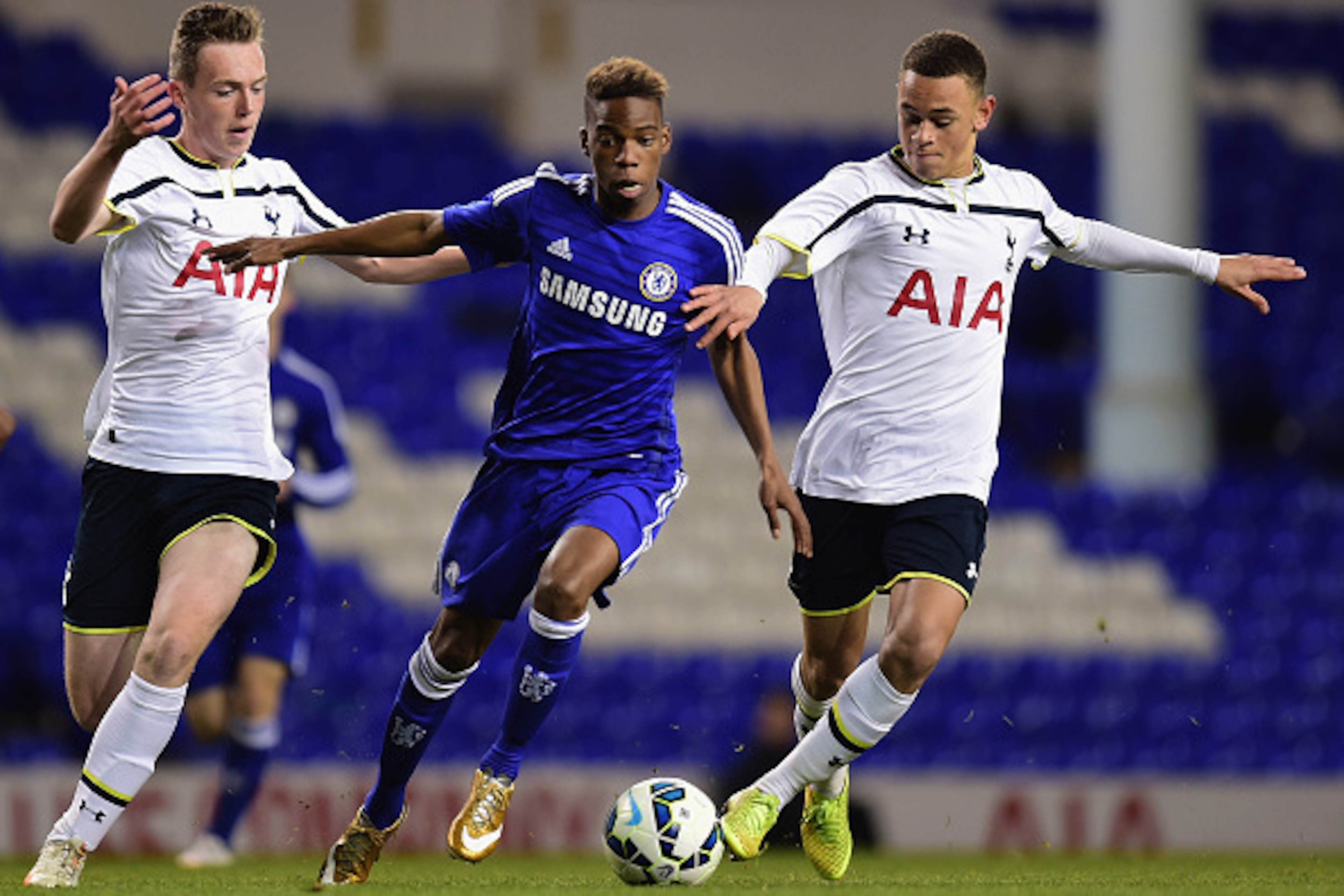 LONDON, ENGLAND - MARCH 05:  Charly Musonda of Chelsea battles with Luke Amos and Charlie Owens of Spurs during the FA Youth Cup Semi Final, first leg match between Tottenham Hotspur and Chelsea at White Hart Lane on March 5, 2015 in London, England.  (Ph