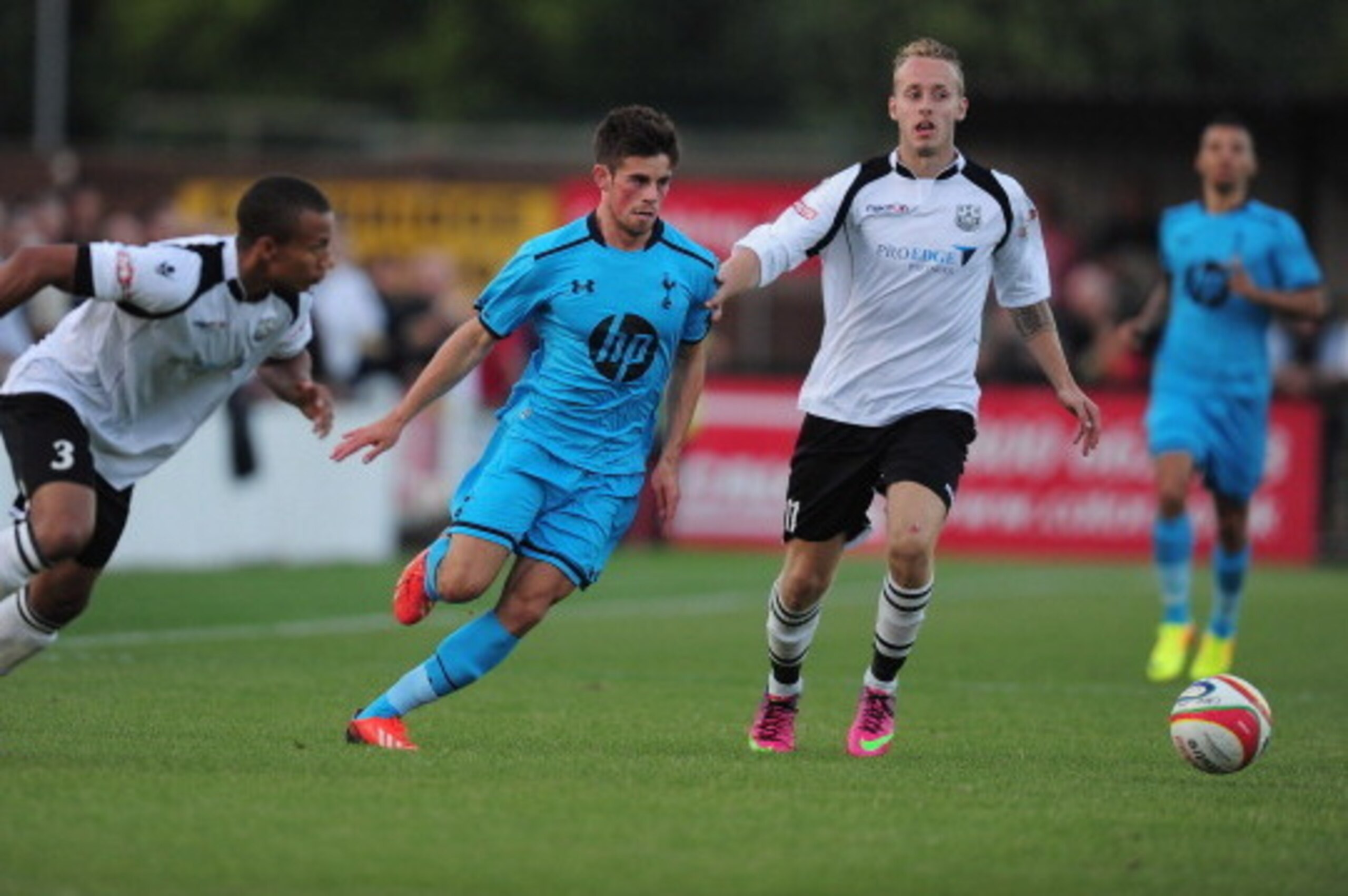 CAMBRIDGE, CAMBRIDGESHIRE - AUGUST 07: Kenneth McEvoy of Tottenham Hotspur in action during the pre-season friendly match between Cambridge City and Tottenham Hotspur at the Glassworld Stadium on August 7, 2013 in Cambridge, Cambridgeshire. (Photo by Ja CAMBRIDGE, CAMBRIDGESHIRE - AUGUST 07: Kenneth McEvoy of Tottenham Hotspur in action during the pre-season friendly match between Cambridge City and Tottenham Hotspur at the Glassworld Stadium on August 7, 2013 in Cambridge, Cambridgeshire. (Photo by Ja