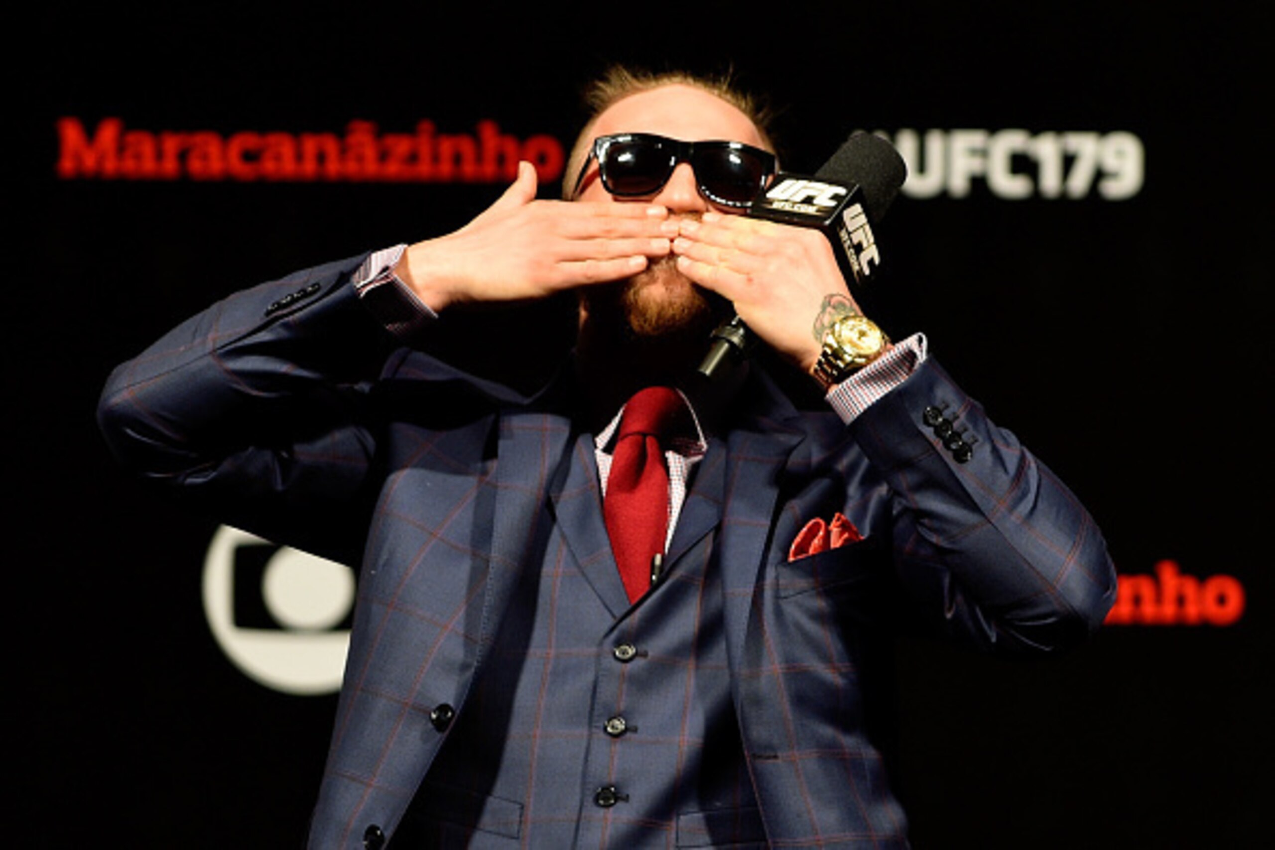 RIO DE JANEIRO, BRAZIL - OCTOBER 24:  Conor McGregor of Ireland interacts with fans during a Q&A session before the UFC 179 weigh-in  at Maracanazinho on October 24, 2014 in Rio de Janeiro, Brazil.  (Photo by Buda Mendes/Getty Images)