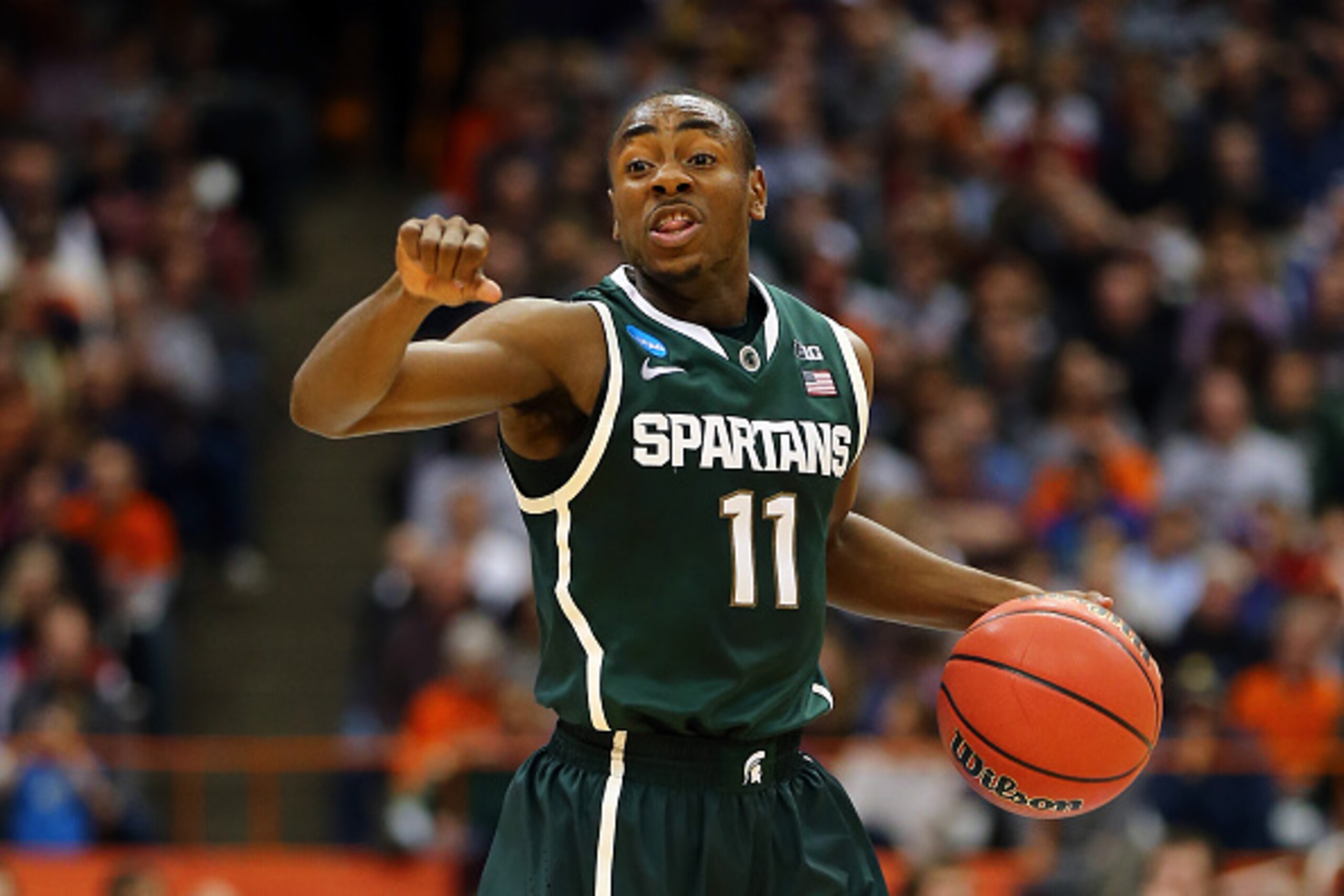 SYRACUSE, NY - MARCH 27:  Lourawls Nairn Jr. #11 of the Michigan State Spartans signals down court in the second half of the game against the Oklahoma Sooners during the East Regional Semifinal of the 2015 NCAA Men's Basketball Tournament at the Carrier D