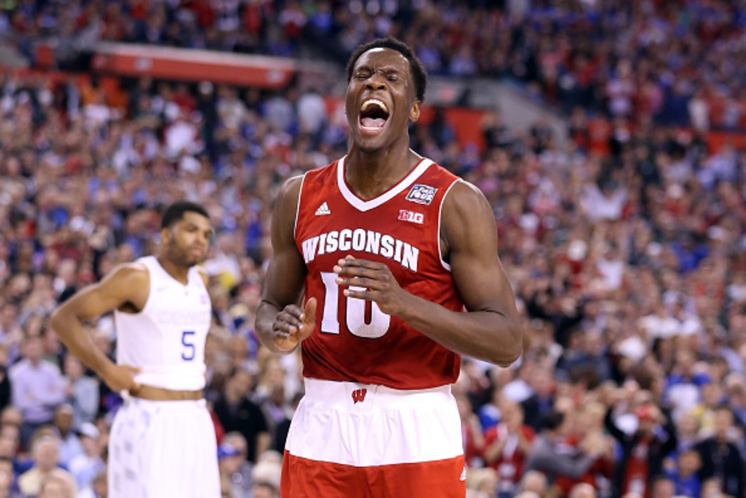 INDIANAPOLIS, IN - APRIL 04:  Nigel Hayes #10 of the Wisconsin Badgers celebrates late in the game against the Kentucky Wildcats during the NCAA Men's Final Four Semifinal at Lucas Oil Stadium on April 4, 2015 in Indianapolis, Indiana.  (Photo by Andy Lyo