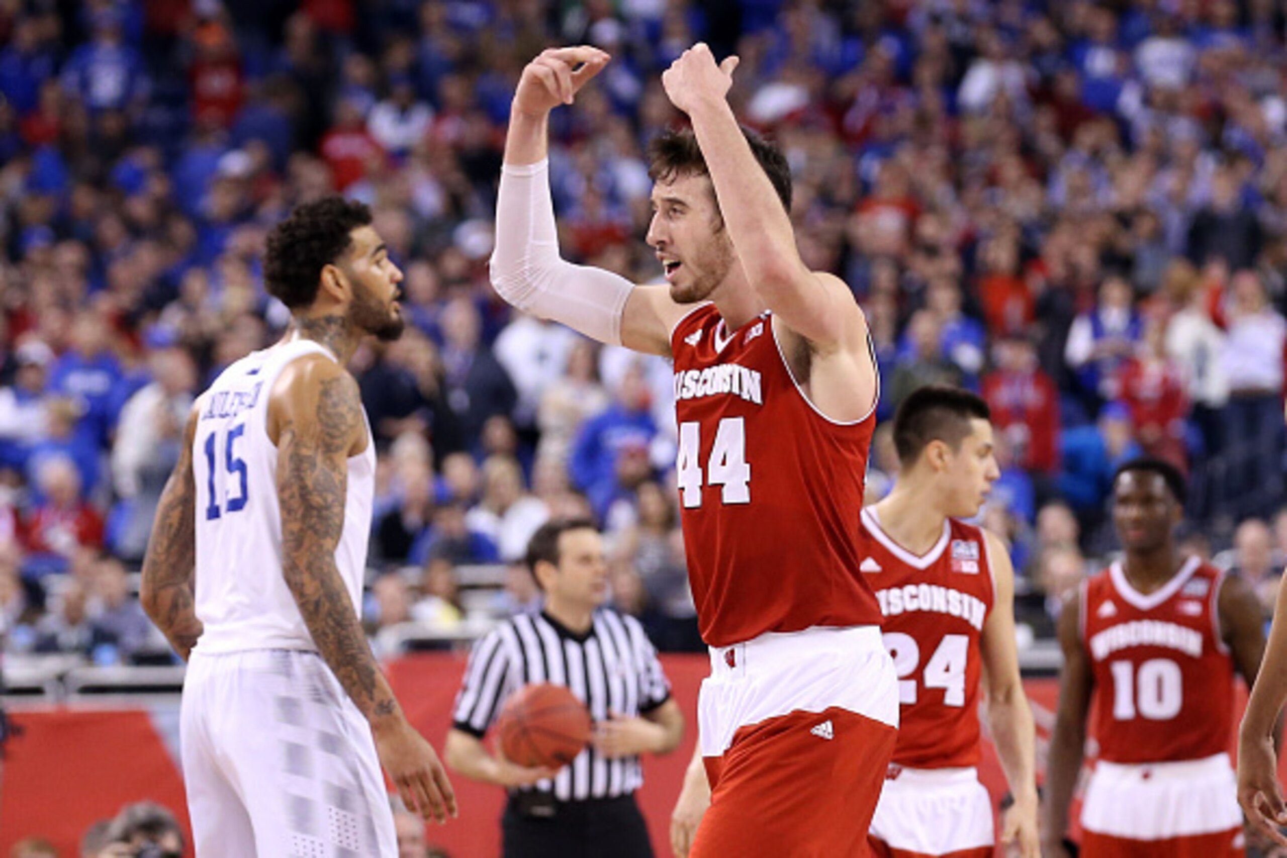 INDIANAPOLIS, IN - APRIL 04:  Frank Kaminsky #44 of the Wisconsin Badgers celebrates late in the game against the Kentucky Wildcats during the NCAA Men's Final Four Semifinal at Lucas Oil Stadium on April 4, 2015 in Indianapolis, Indiana.  (Photo by Stree