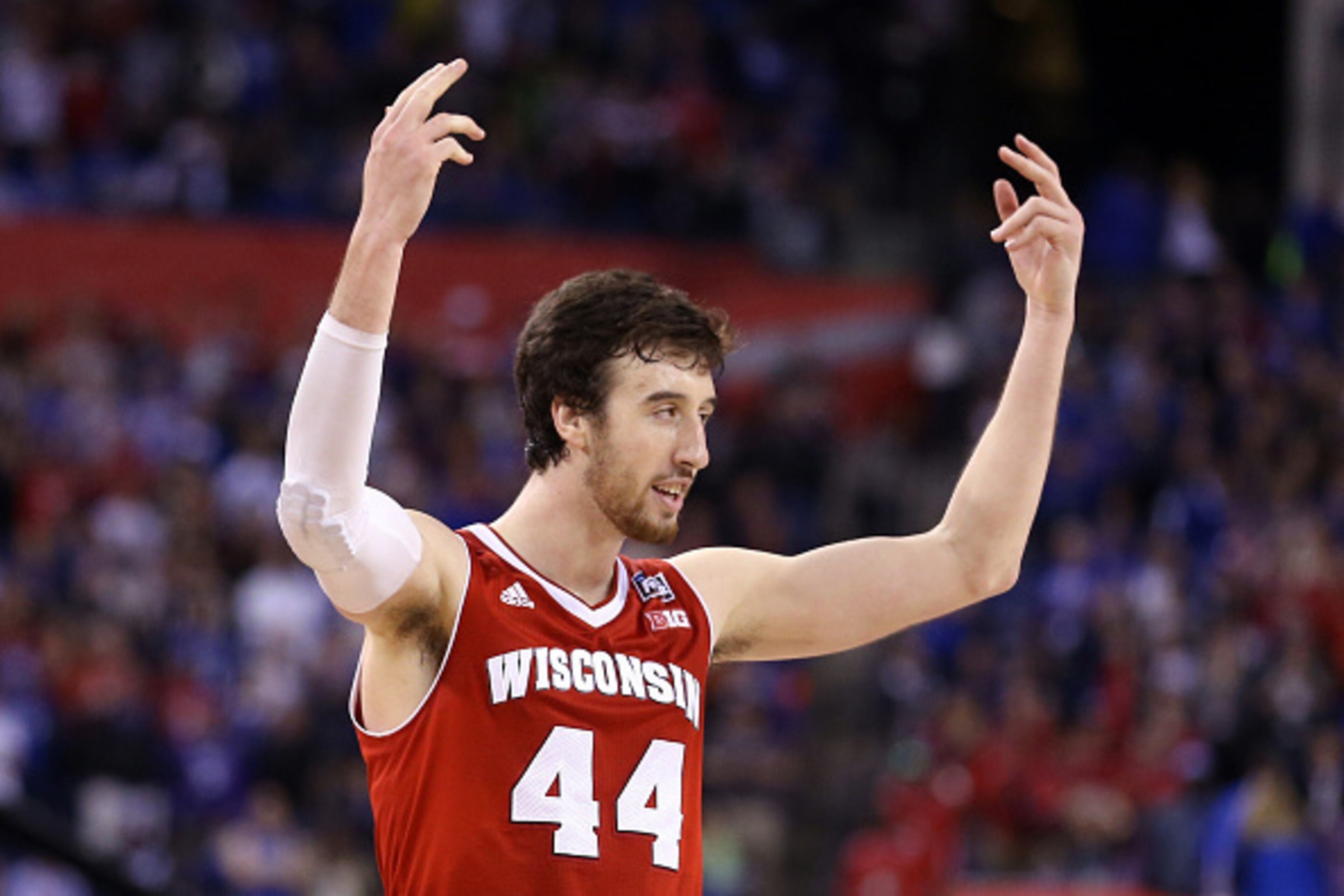 INDIANAPOLIS, IN - APRIL 04:  Frank Kaminsky #44 of the Wisconsin Badgers reacts late in the game against the Kentucky Wildcats during the NCAA Men's Final Four Semifinal at Lucas Oil Stadium on April 4, 2015 in Indianapolis, Indiana.  (Photo by Streeter 