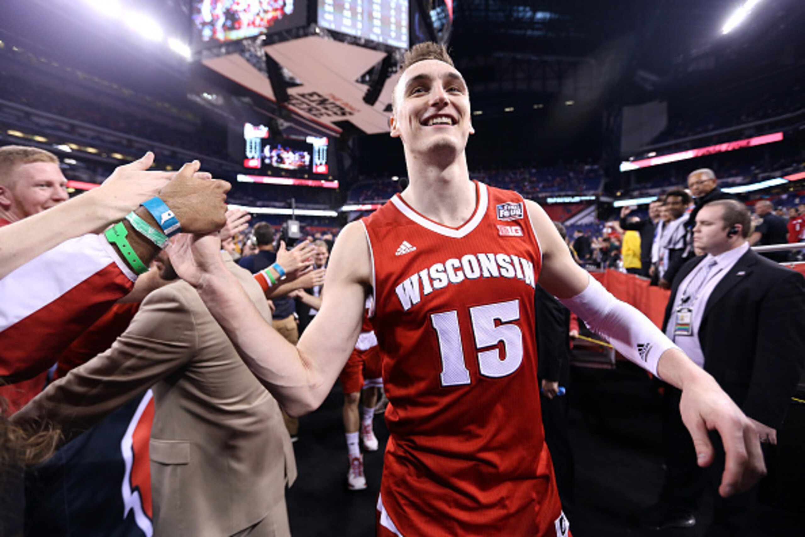 INDIANAPOLIS, IN - APRIL 04: Sam Dekker #15 of the Wisconsin Badgers celebrates after defeating the Kentucky Wildcats during the NCAA Men's Final Four Semifinal at Lucas Oil Stadium on April 4, 2015 in Indianapolis, Indiana. Wisconsin defeated Kentucky 7 INDIANAPOLIS, IN - APRIL 04: Sam Dekker #15 of the Wisconsin Badgers celebrates after defeating the Kentucky Wildcats during the NCAA Men's Final Four Semifinal at Lucas Oil Stadium on April 4, 2015 in Indianapolis, Indiana. Wisconsin defeated Kentucky 7