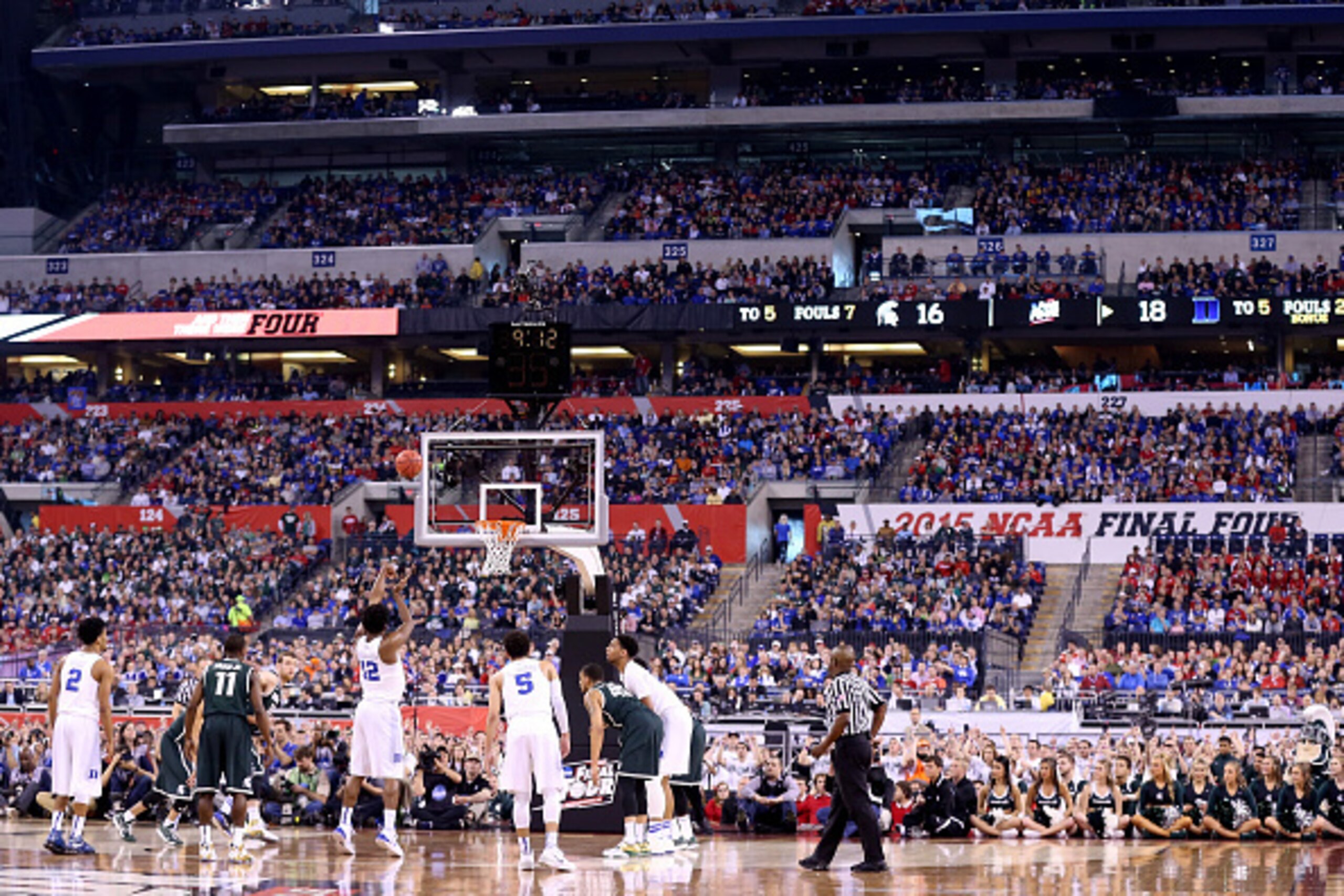 INDIANAPOLIS, IN - APRIL 04: Justise Winslow #12 of the Duke Blue Devils shoots a free throw in the first half against the Michigan State Spartans during the NCAA Men's Final Four Semifinal at Lucas Oil Stadium on April 4, 2015 in Indianapolis, Indiana. INDIANAPOLIS, IN - APRIL 04: Justise Winslow #12 of the Duke Blue Devils shoots a free throw in the first half against the Michigan State Spartans during the NCAA Men's Final Four Semifinal at Lucas Oil Stadium on April 4, 2015 in Indianapolis, Indiana.