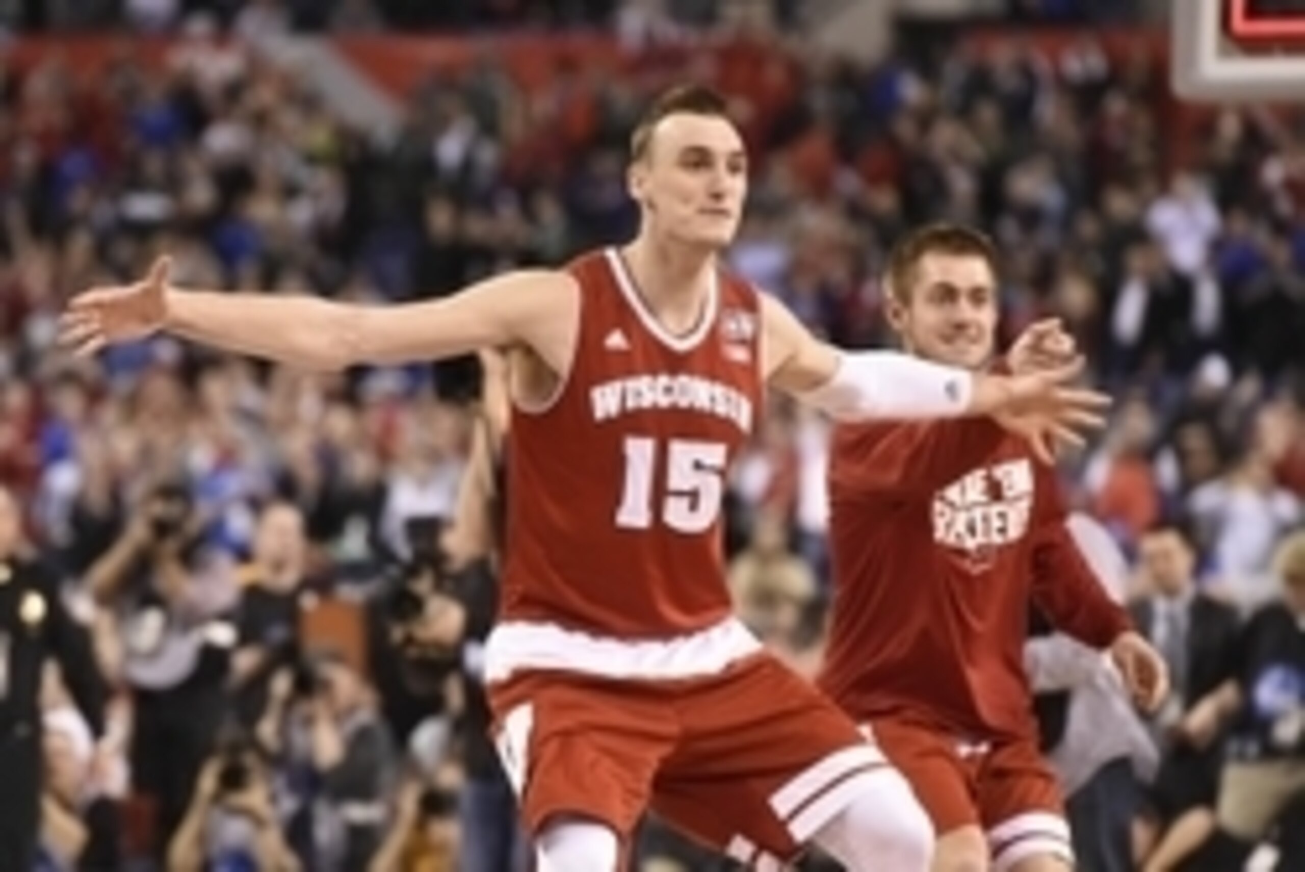 Apr 4, 2015; Indianapolis, IN, USA; Wisconsin Badgers forward Sam Dekker (15) celebrates after defeating the Kentucky Wildcats 71-64 in the 2015 NCAA Men's Division I Championship semi-final game at Lucas Oil Stadium. Mandatory Credit: Robert Deutsch-USA Apr 4, 2015; Indianapolis, IN, USA; Wisconsin Badgers forward Sam Dekker (15) celebrates after defeating the Kentucky Wildcats 71-64 in the 2015 NCAA Men's Division I Championship semi-final game at Lucas Oil Stadium. Mandatory Credit: Robert Deutsch-USA