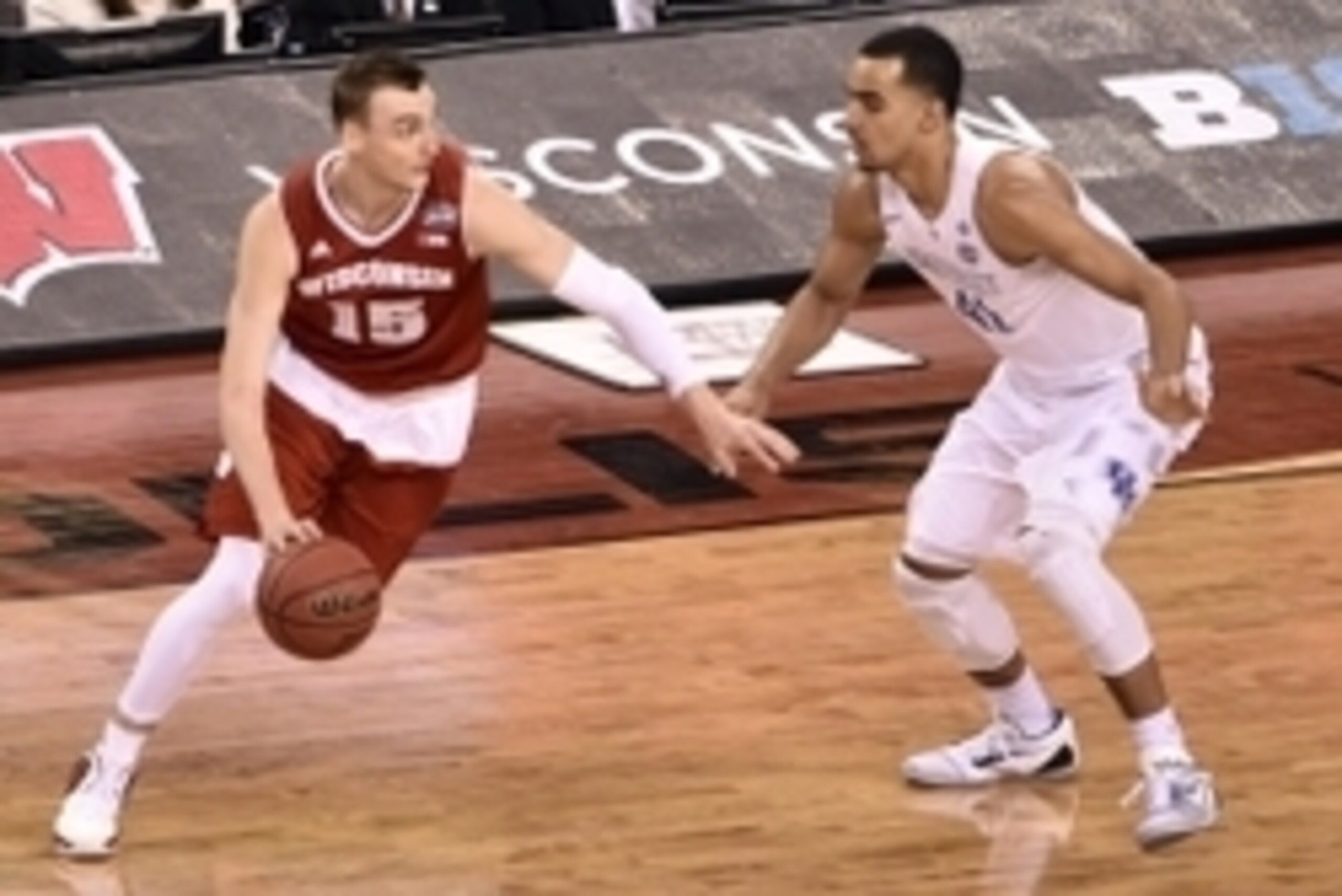Apr 4, 2015; Indianapolis, IN, USA; Wisconsin Badgers forward Sam Dekker (15) handles the ball against Kentucky Wildcats forward Trey Lyles (41) during the second half of the 2015 NCAA Men's Division I Championship semi-final game at Lucas Oil Stadium. Ma Apr 4, 2015; Indianapolis, IN, USA; Wisconsin Badgers forward Sam Dekker (15) handles the ball against Kentucky Wildcats forward Trey Lyles (41) during the second half of the 2015 NCAA Men's Division I Championship semi-final game at Lucas Oil Stadium. Ma