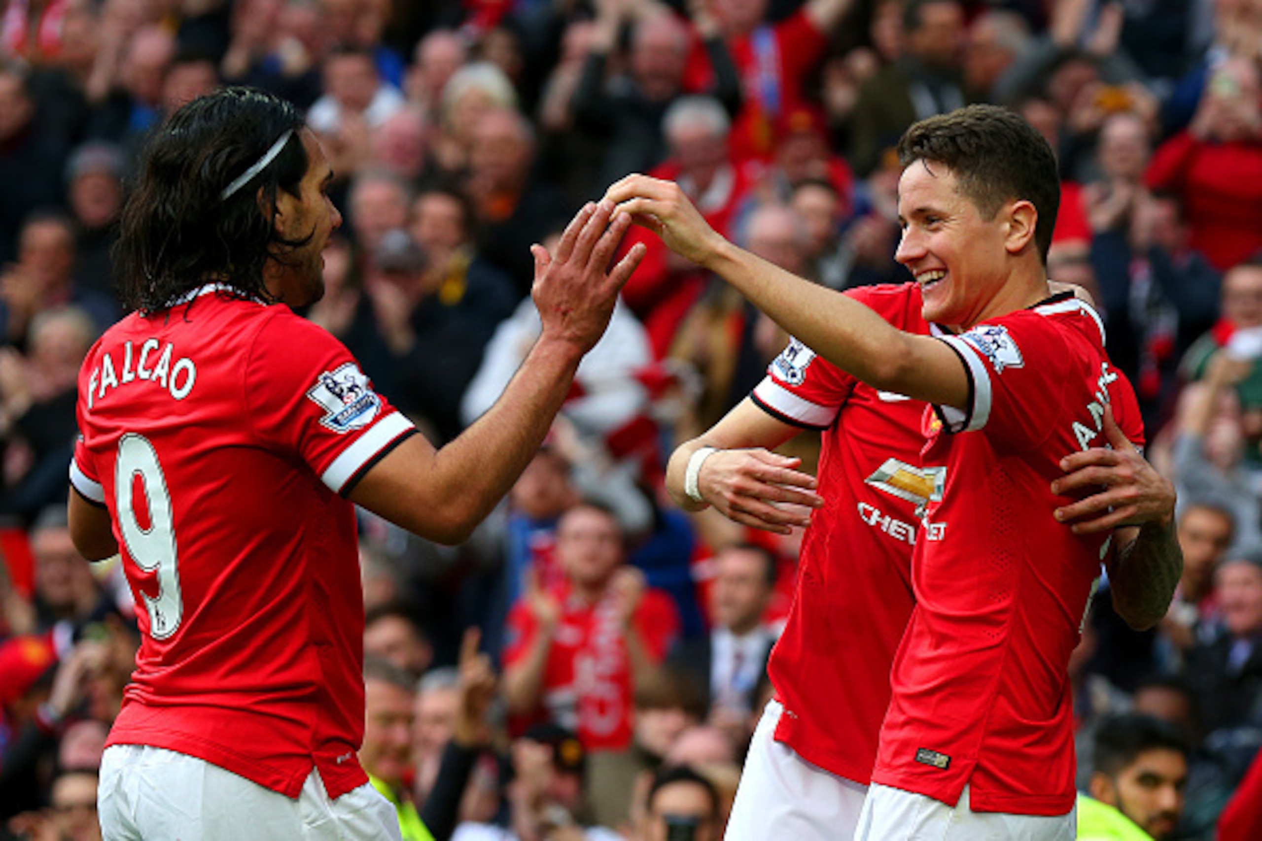 MANCHESTER, ENGLAND - APRIL 04:  Ander Herrera of Manchester United celebrates with team-mates after scoring his team's third goal during the Barclays Premier League match between Manchester United and Aston Villa at Old Trafford on April 4, 2015 in Manch