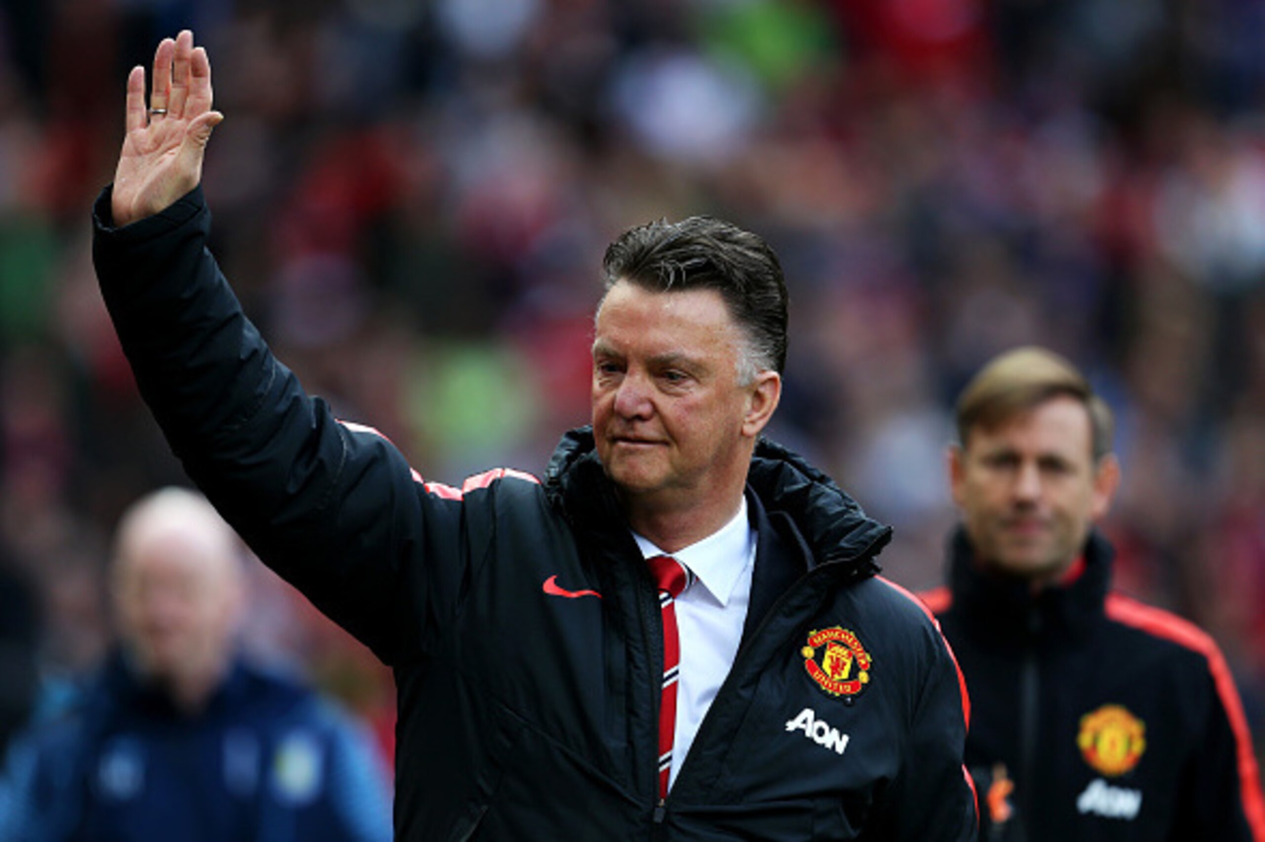 MANCHESTER, ENGLAND - APRIL 04:  Louis van Gaal, manager of Manchester United waves to the fans as he walks out for the Barclays Premier League match between Manchester United and Aston Villa at Old Trafford on April 4, 2015 in Manchester, England.  (Phot