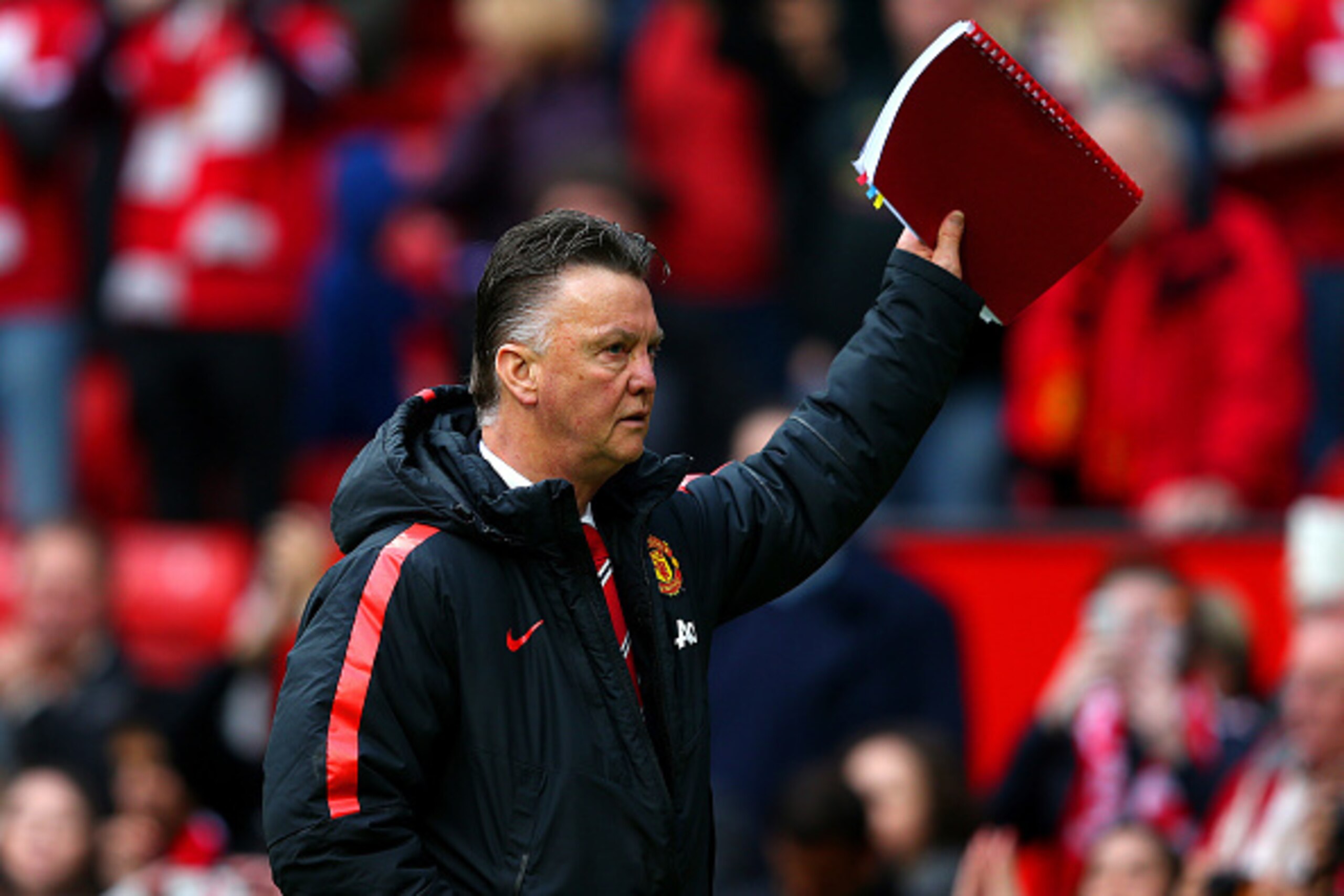 MANCHESTER, ENGLAND - APRIL 04:  Louis van Gaal, manager of Manchester United waves to the crowd after the Barclays Premier League match between Manchester United and Aston Villa at Old Trafford on April 4, 2015 in Manchester, England.  (Photo by Alex Liv