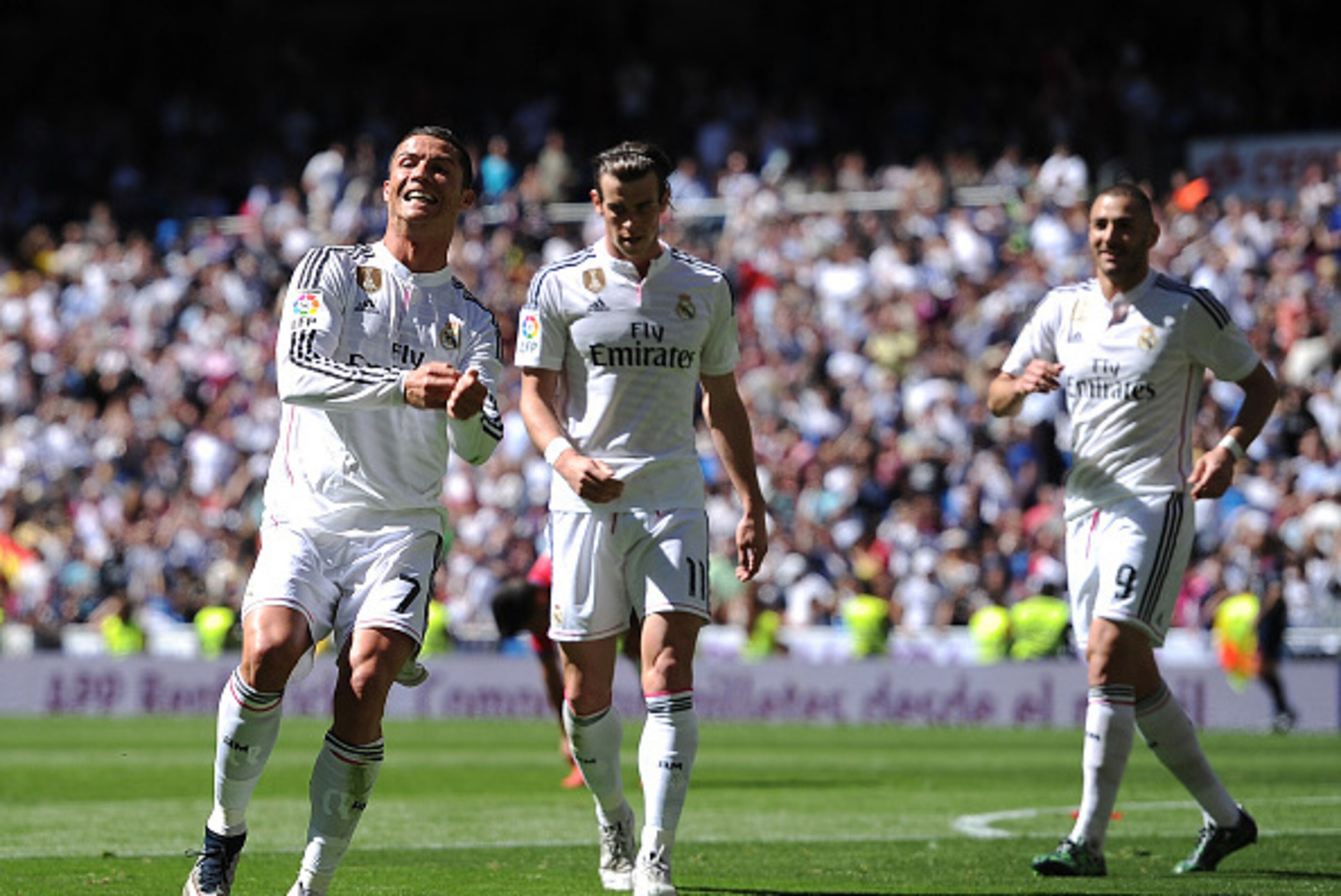 MADRID, SPAIN - APRIL 05: Cristiano Ronaldo of Real Madrid CF celebrates after scoring his team's 4th goal during the La Liga match between Real Madrid CF and Granada CF at Estadio Santiago Bernabeu on April 5, 2015 in Madrid, Spain. (Photo by Denis Doy MADRID, SPAIN - APRIL 05: Cristiano Ronaldo of Real Madrid CF celebrates after scoring his team's 4th goal during the La Liga match between Real Madrid CF and Granada CF at Estadio Santiago Bernabeu on April 5, 2015 in Madrid, Spain. (Photo by Denis Doy
