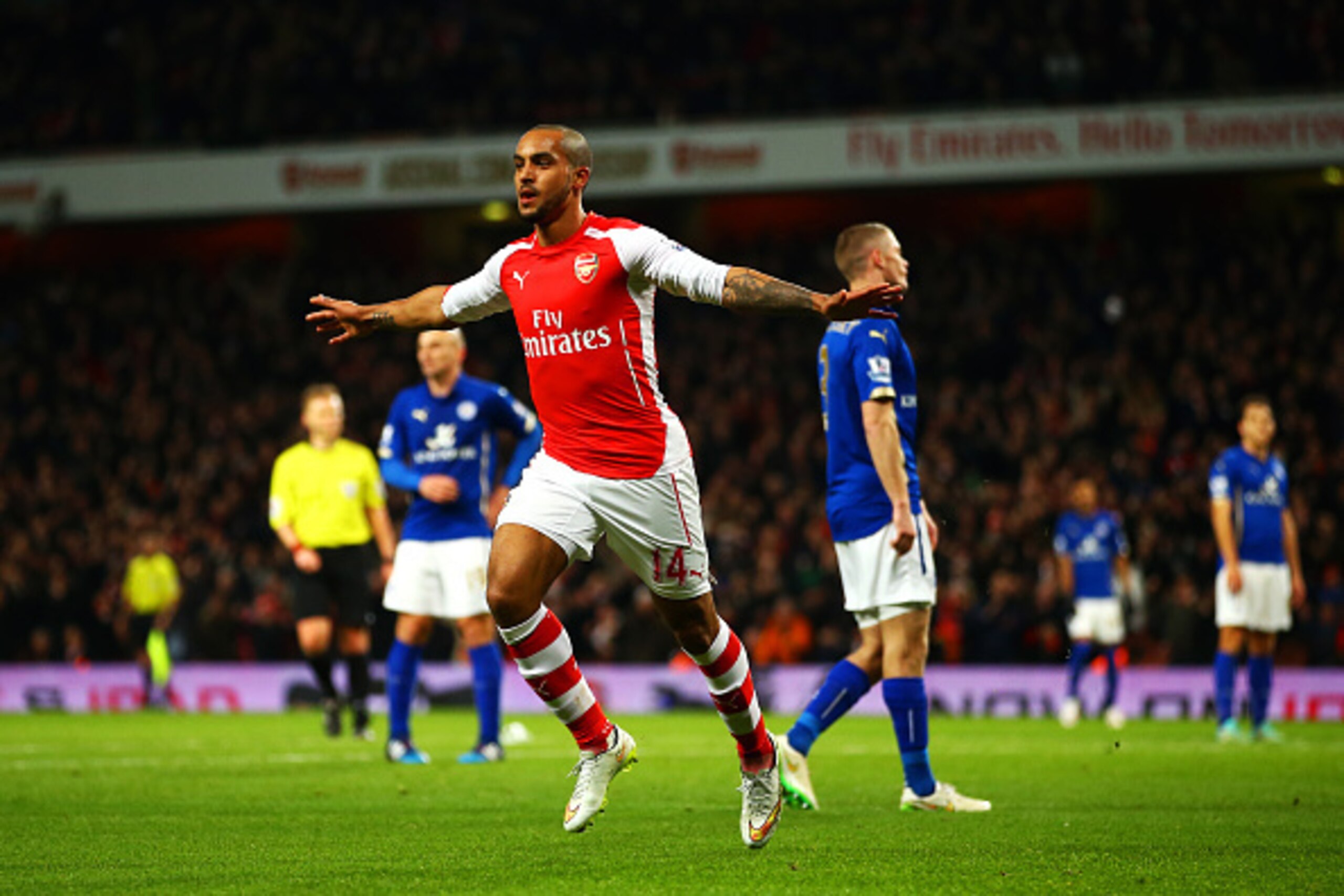LONDON, ENGLAND - FEBRUARY 10:  Theo Walcott of Arsenal celebrates after scoring his team's second goal during the Barclays Premier League match between Arsenal and Leicester City at Emirates Stadium on February 10, 2015 in London, England.  (Photo by Ric