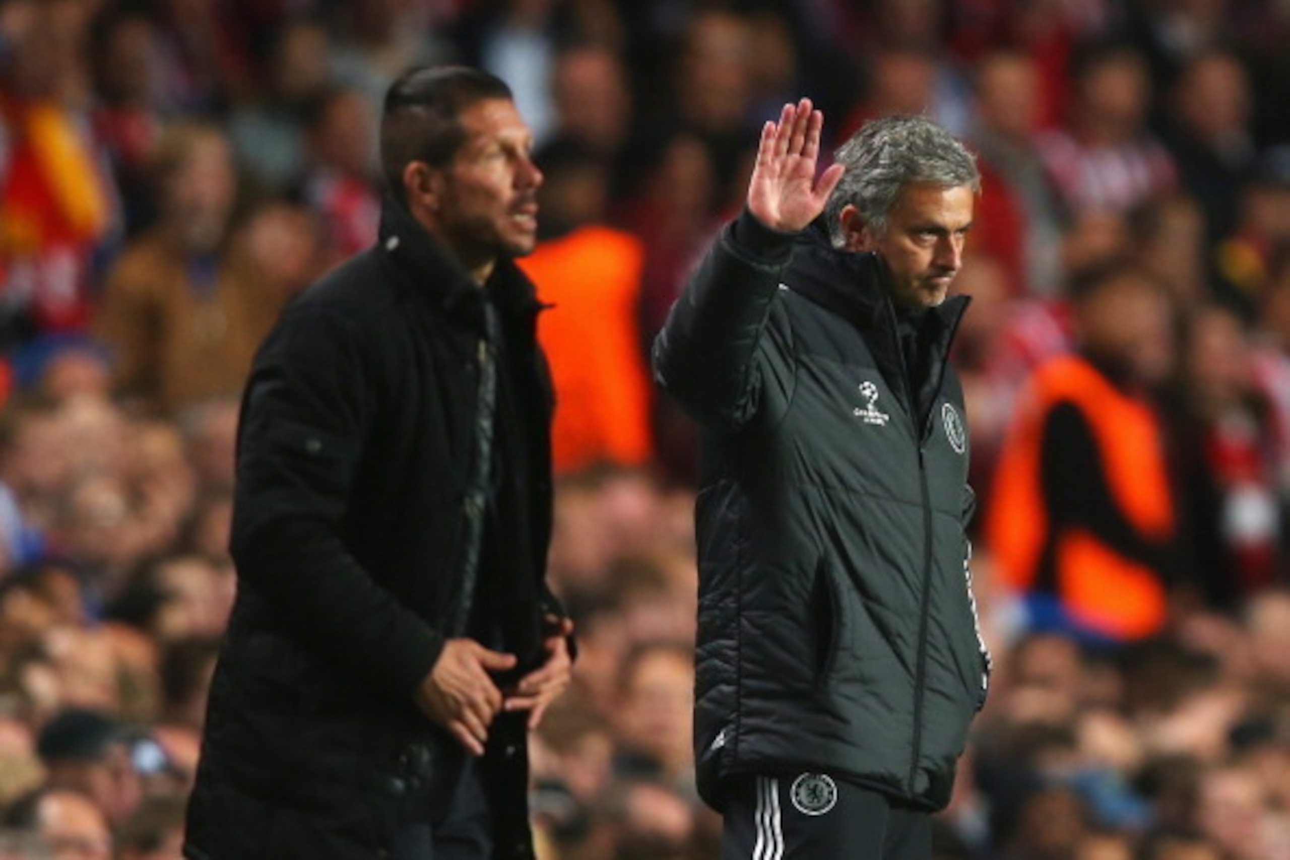 LONDON, ENGLAND - APRIL 30:  Jose Mourinho, manager of Chelsea acknowledges the crowd with Diego Simeone, coach of Club Atletico de Madrid during the UEFA Champions League semi-final second leg match between Chelsea and Club Atletico de Madrid at Stamford