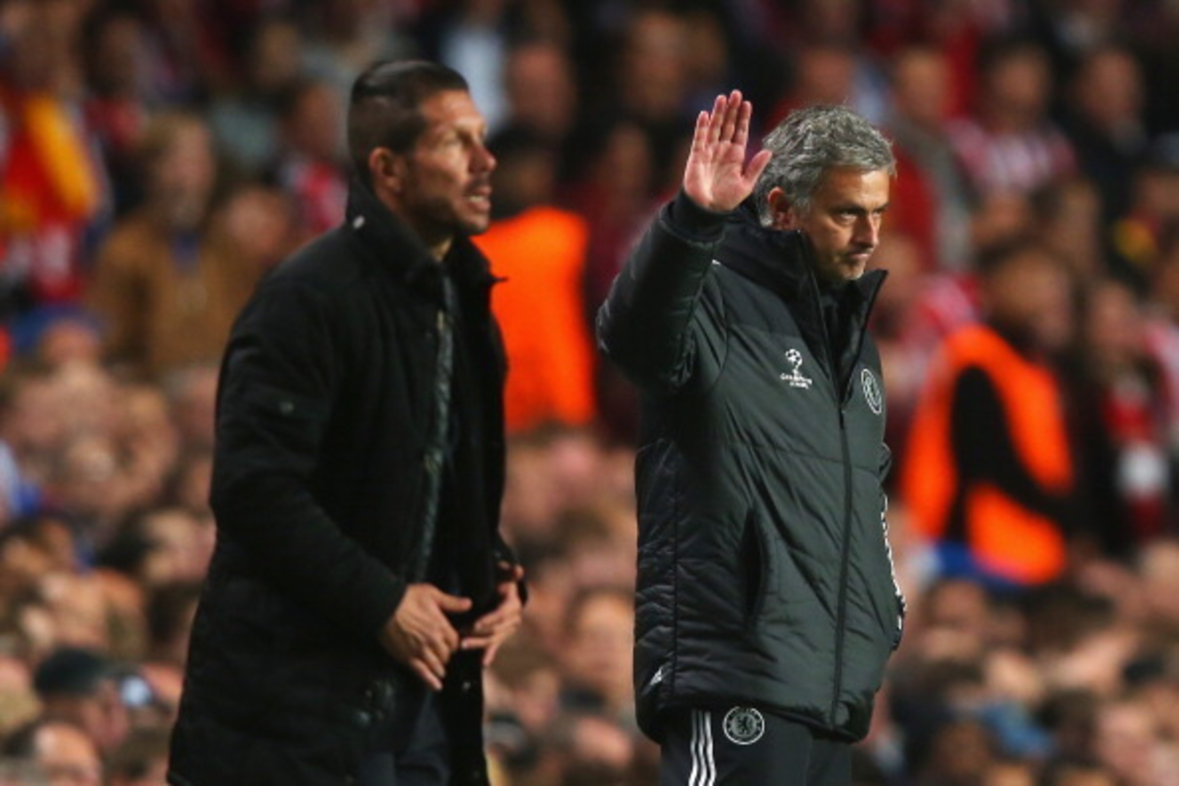 LONDON, ENGLAND - APRIL 30:  Jose Mourinho, manager of Chelsea acknowledges the crowd with Diego Simeone, coach of Club Atletico de Madrid during the UEFA Champions League semi-final second leg match between Chelsea and Club Atletico de Madrid at Stamford